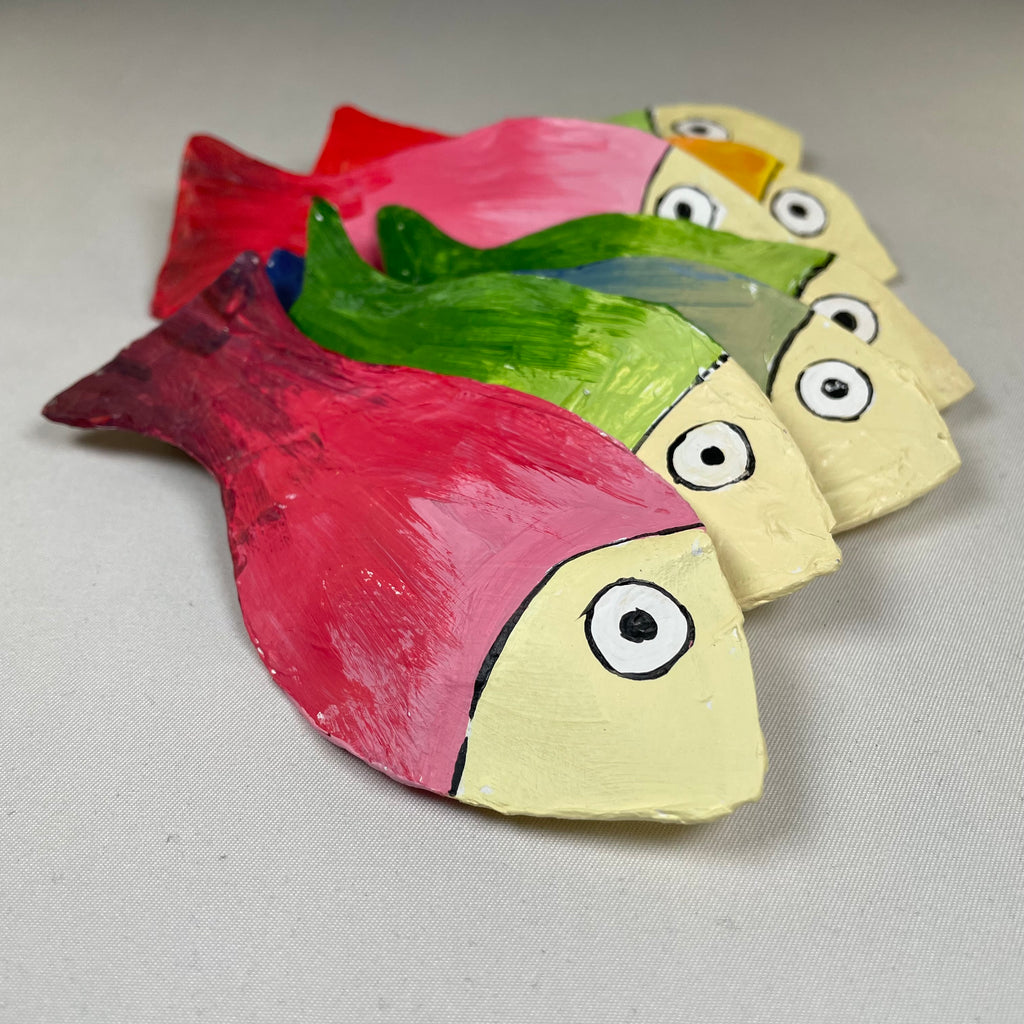 Colorful fish-shaped beach ornament, handmade Curious Rabbit bauble with vibrant hues and detailed craftsmanship.
