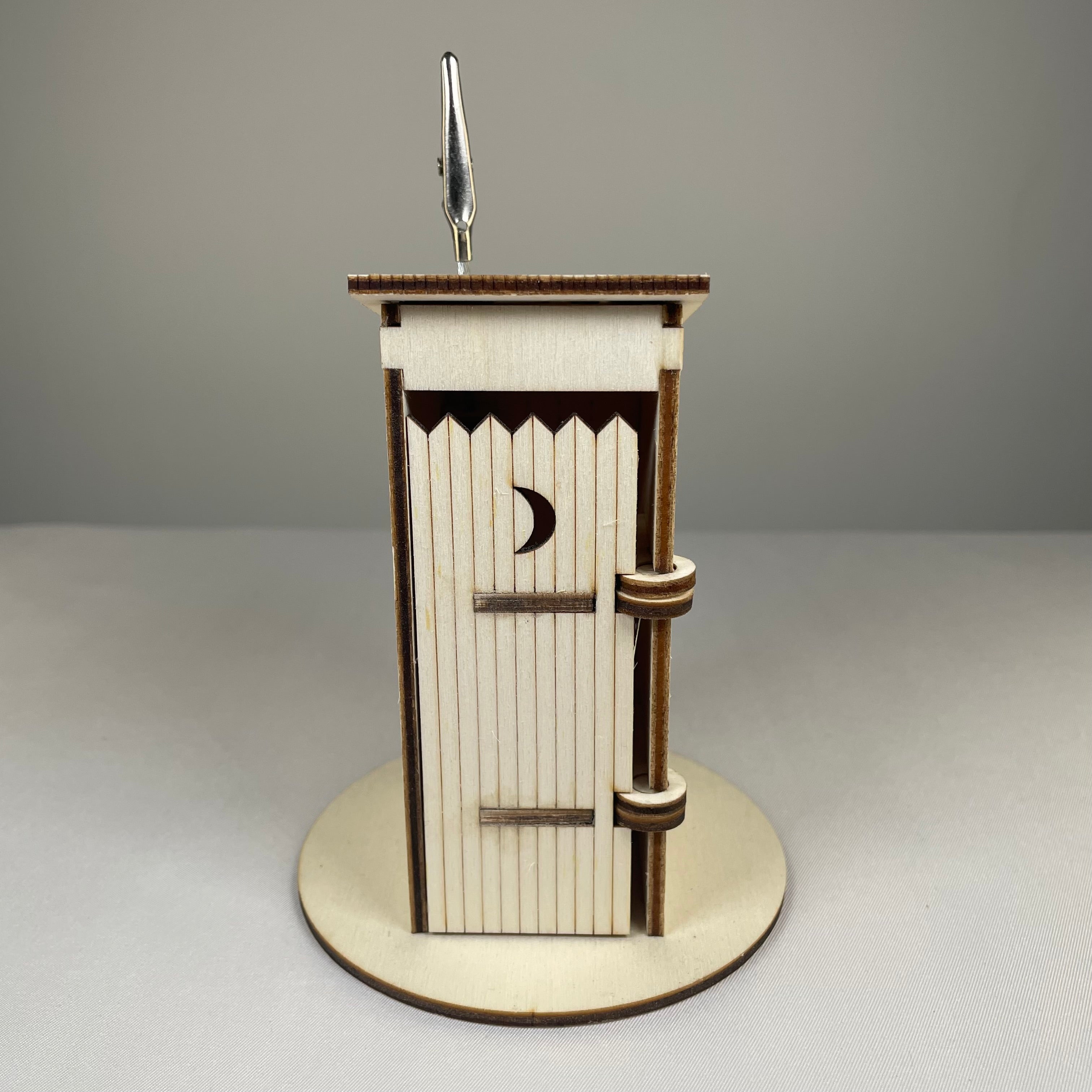 Curious Rabbit Outhouse Toilet flatpack memo holder with architecture-inspired design, made of durable material, detailed model image