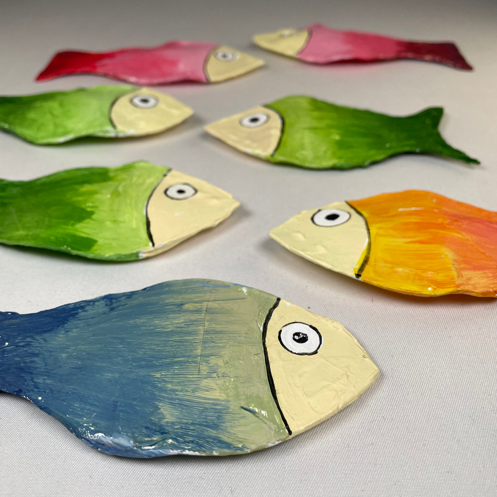 Colorful handmade fish-shaped beach ornament bauble by Curious Rabbit, featuring vibrant hues and detailed craftsmanship.