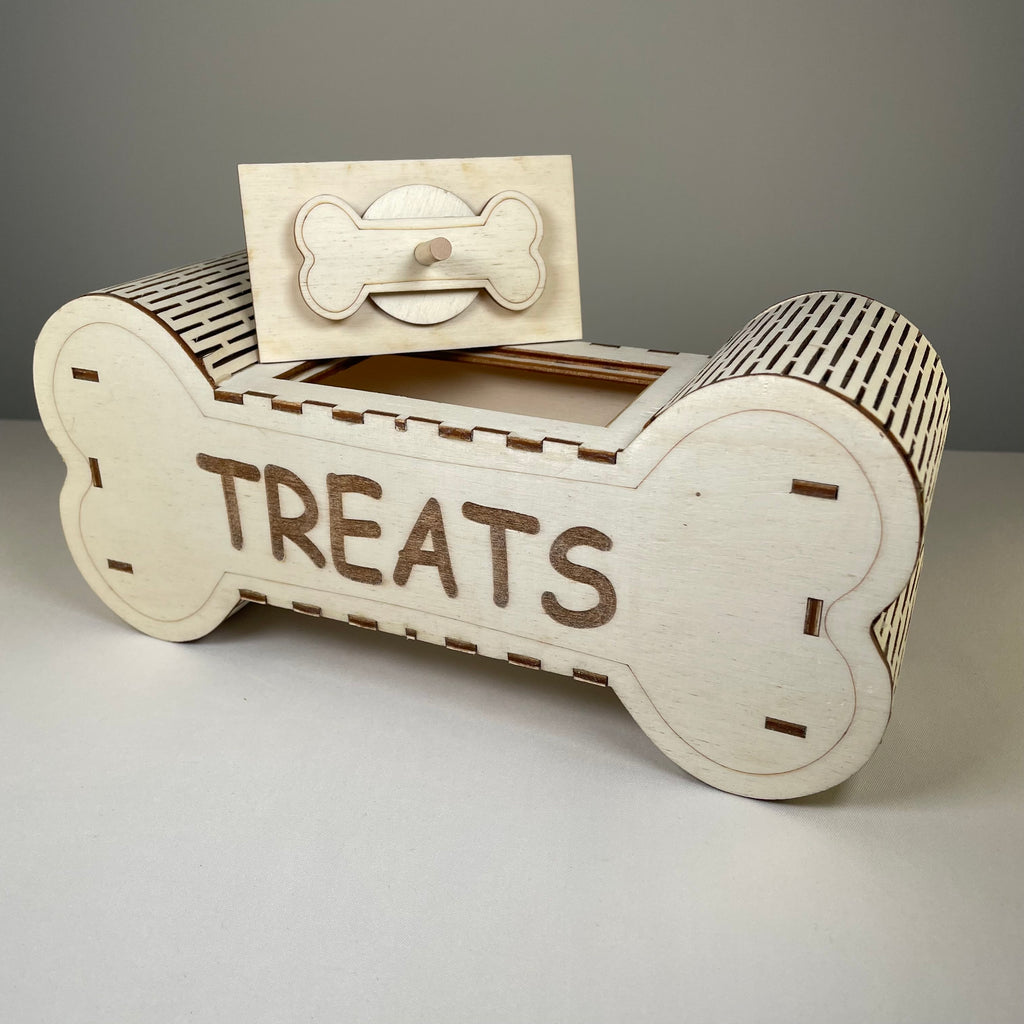 Curious Rabbit Dog Treat Box Flatpack Model Kit, a pet-themed craft kit with colorful packaging and assembly components.