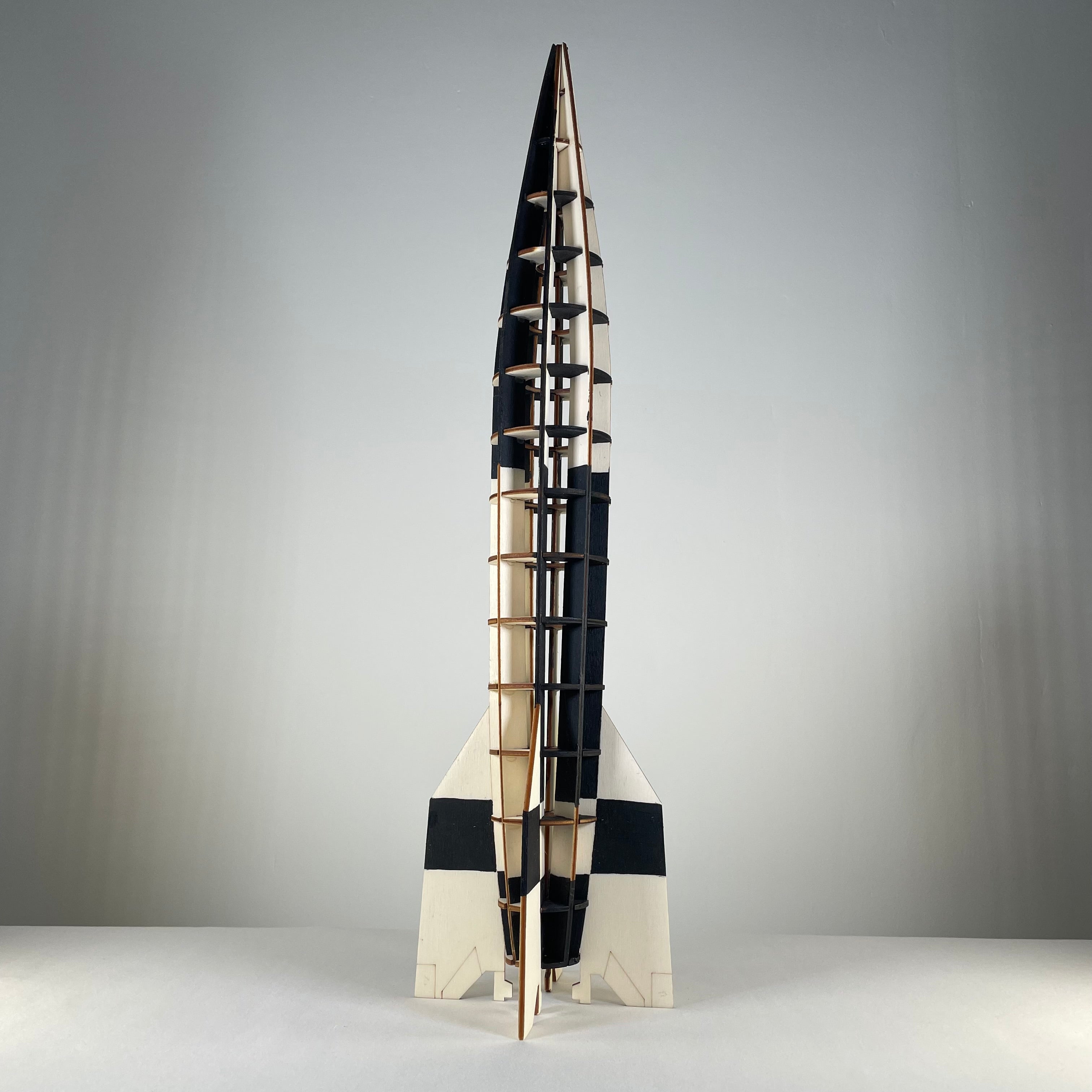 Curious Rabbit Prop V2 Rocket flatpack model kit from the history series, showing assembled model with detailed parts.