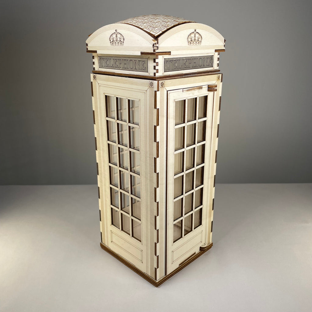 Curious Rabbit Telephone Box Lamp flatpack model kit with icon-style design, showing assembled lamp featuring a vintage telephone box shape.