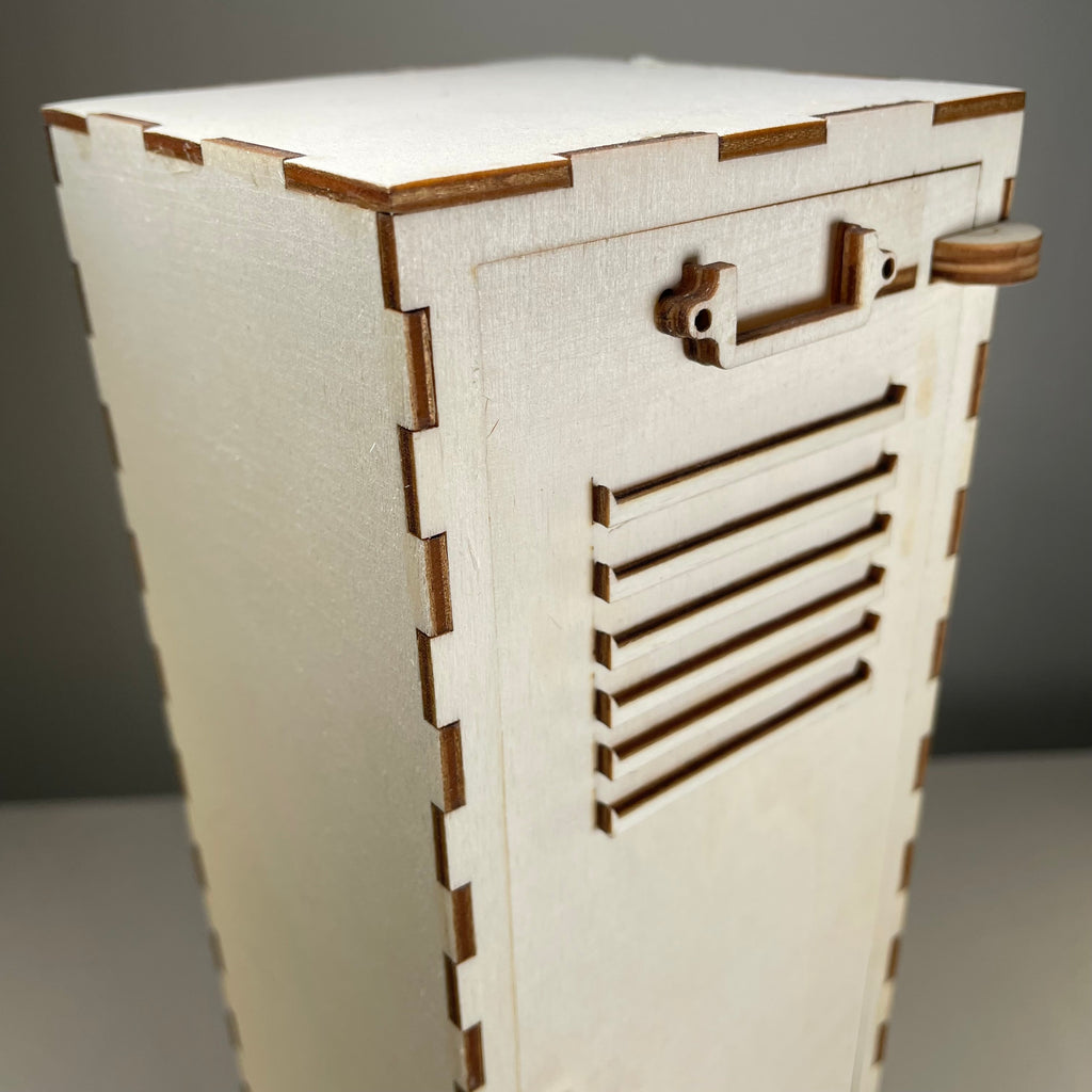 Vintage Curious Rabbit school locker flatpack model kit with detailed doors and handles, suitable for hobby and display purposes.
