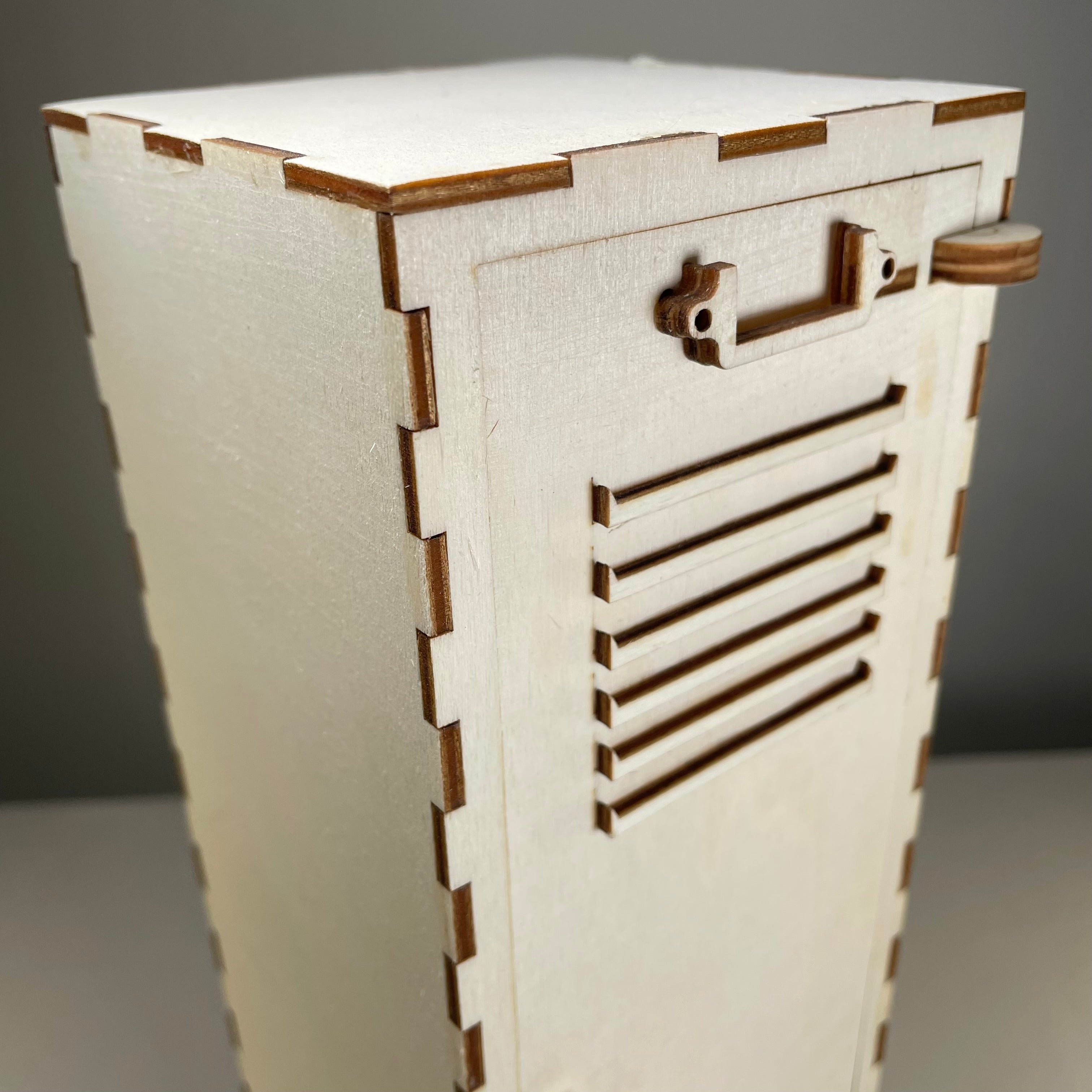 Vintage Curious Rabbit school locker flatpack model kit with detailed doors and handles, suitable for hobby and display purposes.