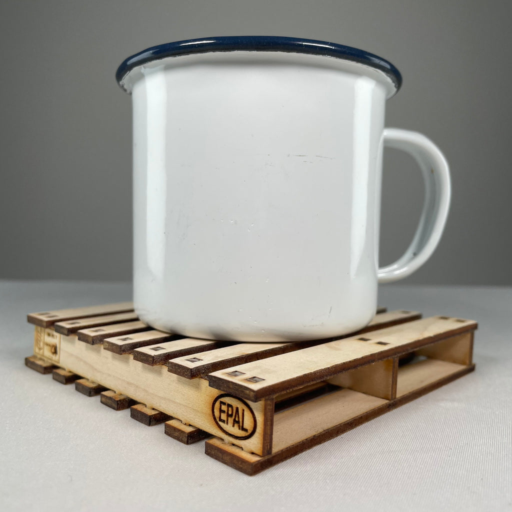 Curious Rabbit flatpack pallet coaster icon kit with assembled coasters and tools on a white background.
