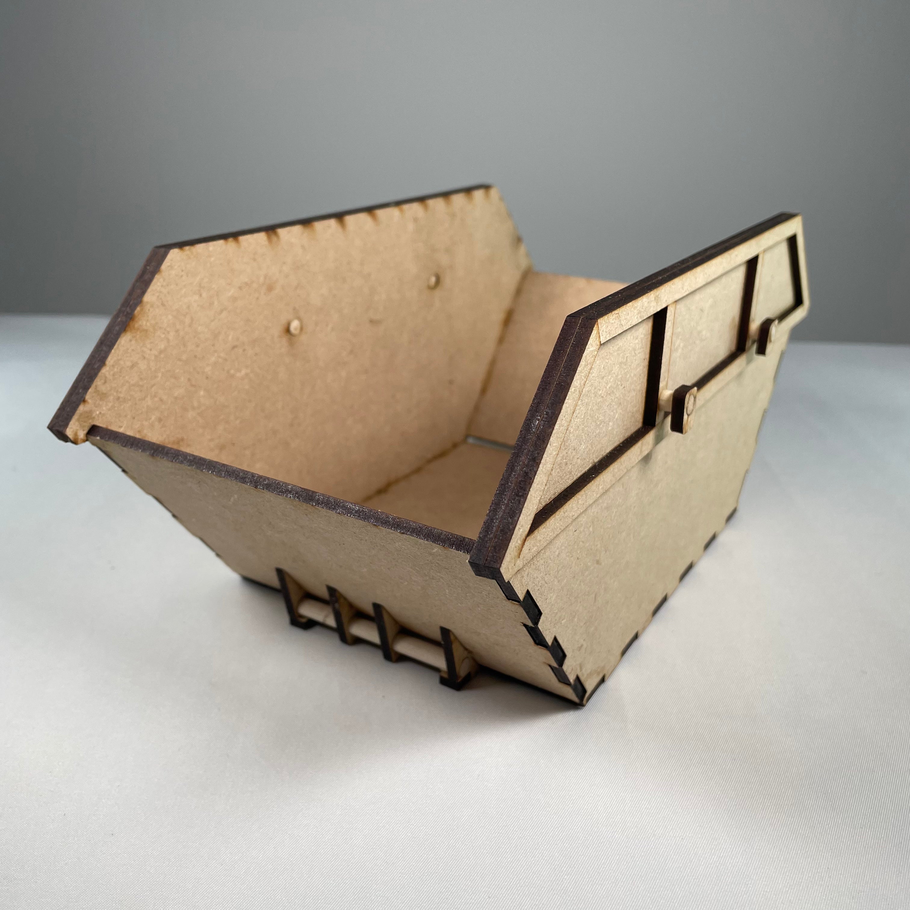 Icon set of the Curious Rabbit Skip Waste Container Flatpack Model Kit, featuring simple, illustrative icons for waste management.