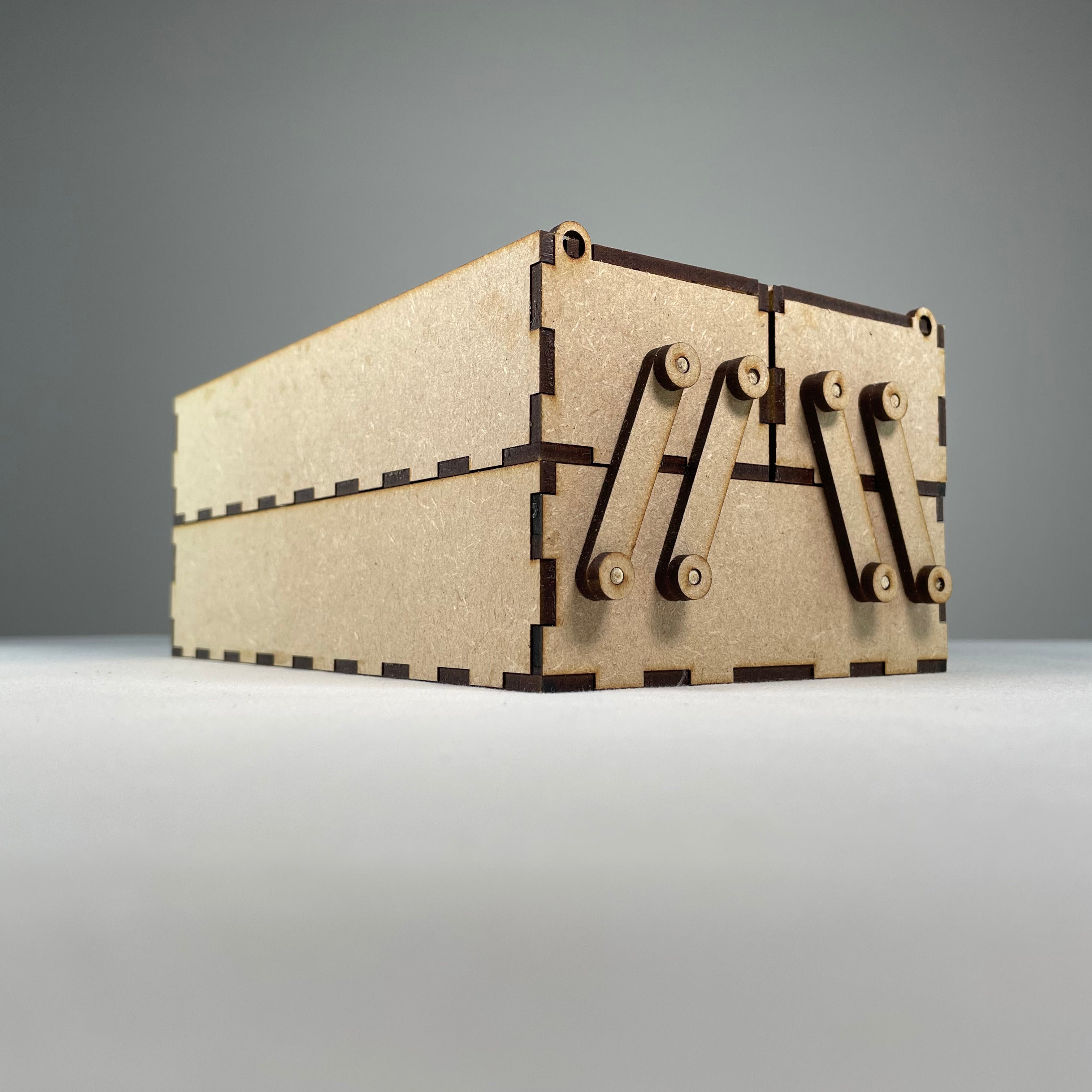 Two-tier toolbox by Curious Rabbit with a flatpack kit, showing assembled wooden storage with compartments and a sturdy handle.
