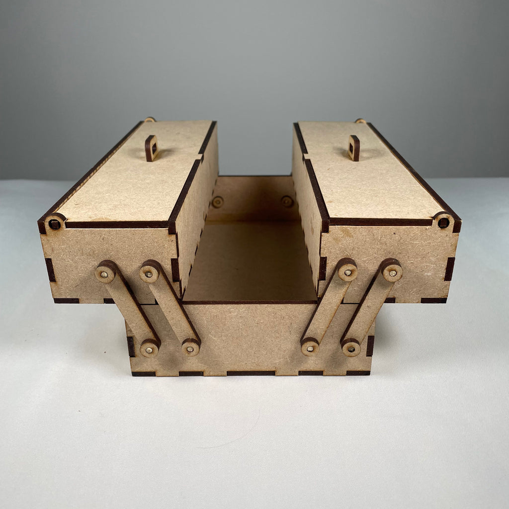 Curious Rabbit two-tier flatpack toolbox with open compartments, designed for organized storage and easy transport.