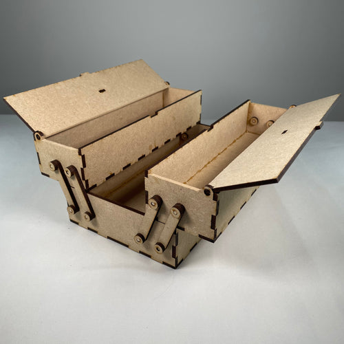 Curious Rabbit two-tier flatpack toolbox with open lid, showing compartments and sturdy construction for organized tool storage.