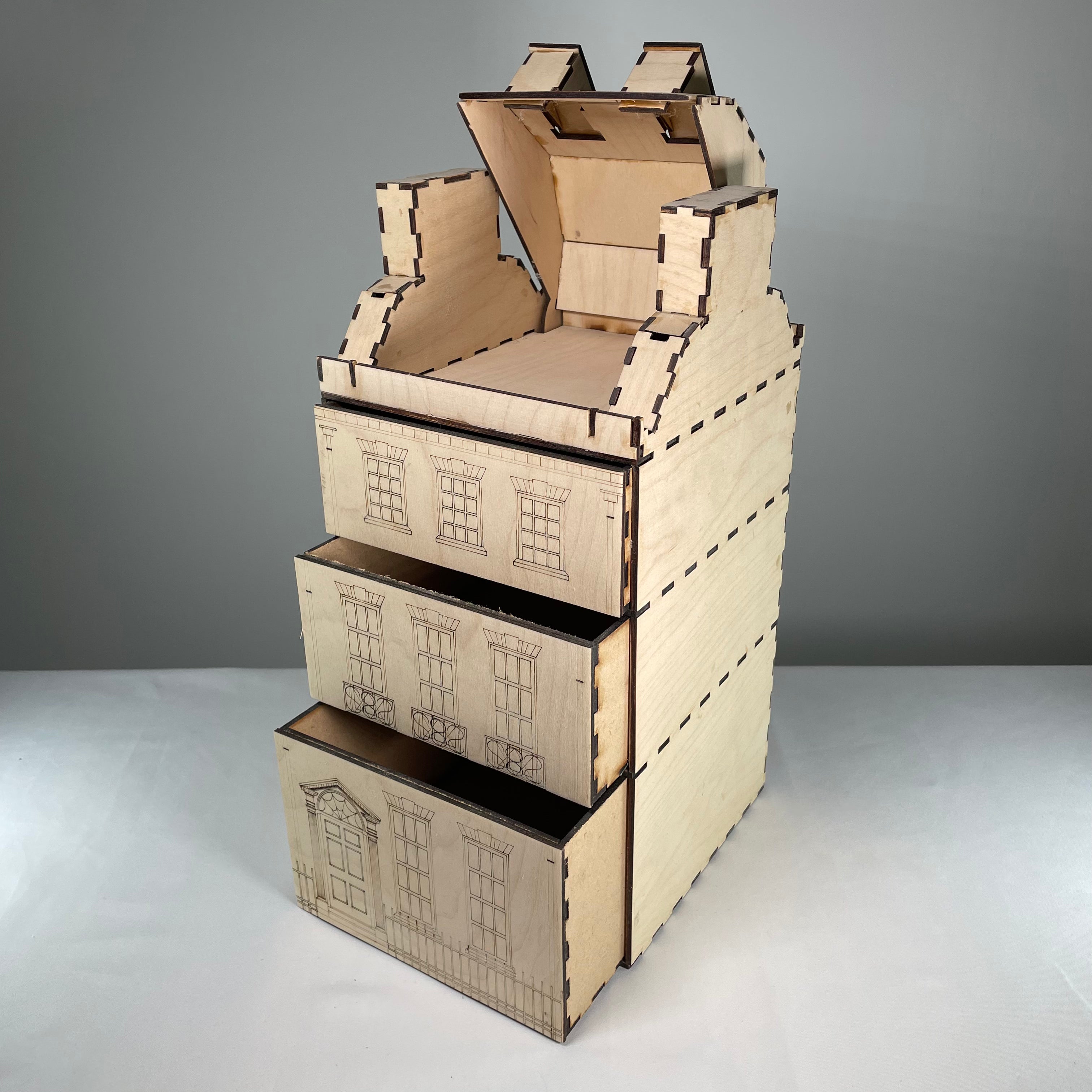 Curious Rabbit Georgian House ready-made architectural model showing detailed miniature Georgian-style building with windows and roof.