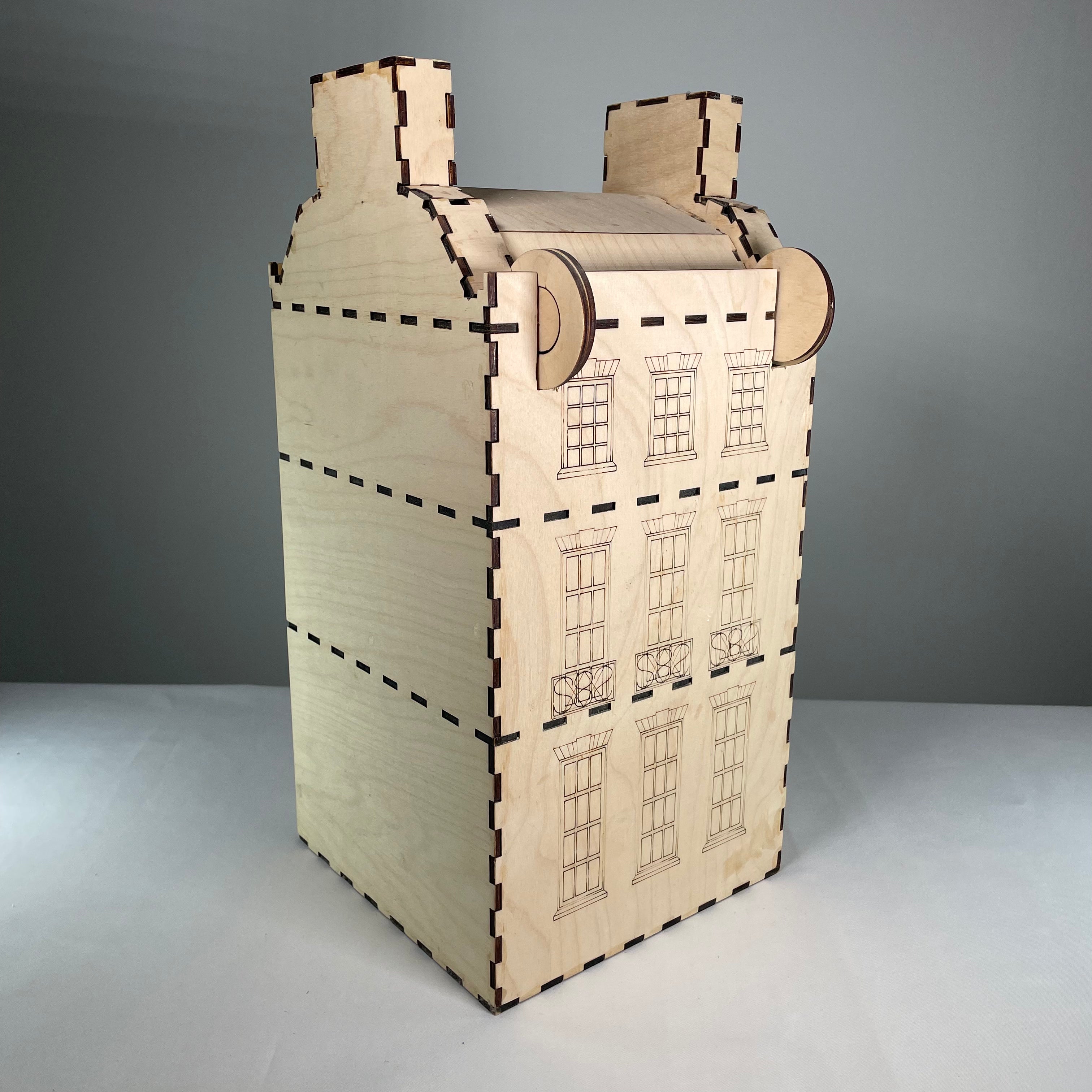 Curious Rabbit Georgian House flatpack model kit showing assembled architecture with detailed Georgian-style design and windows.