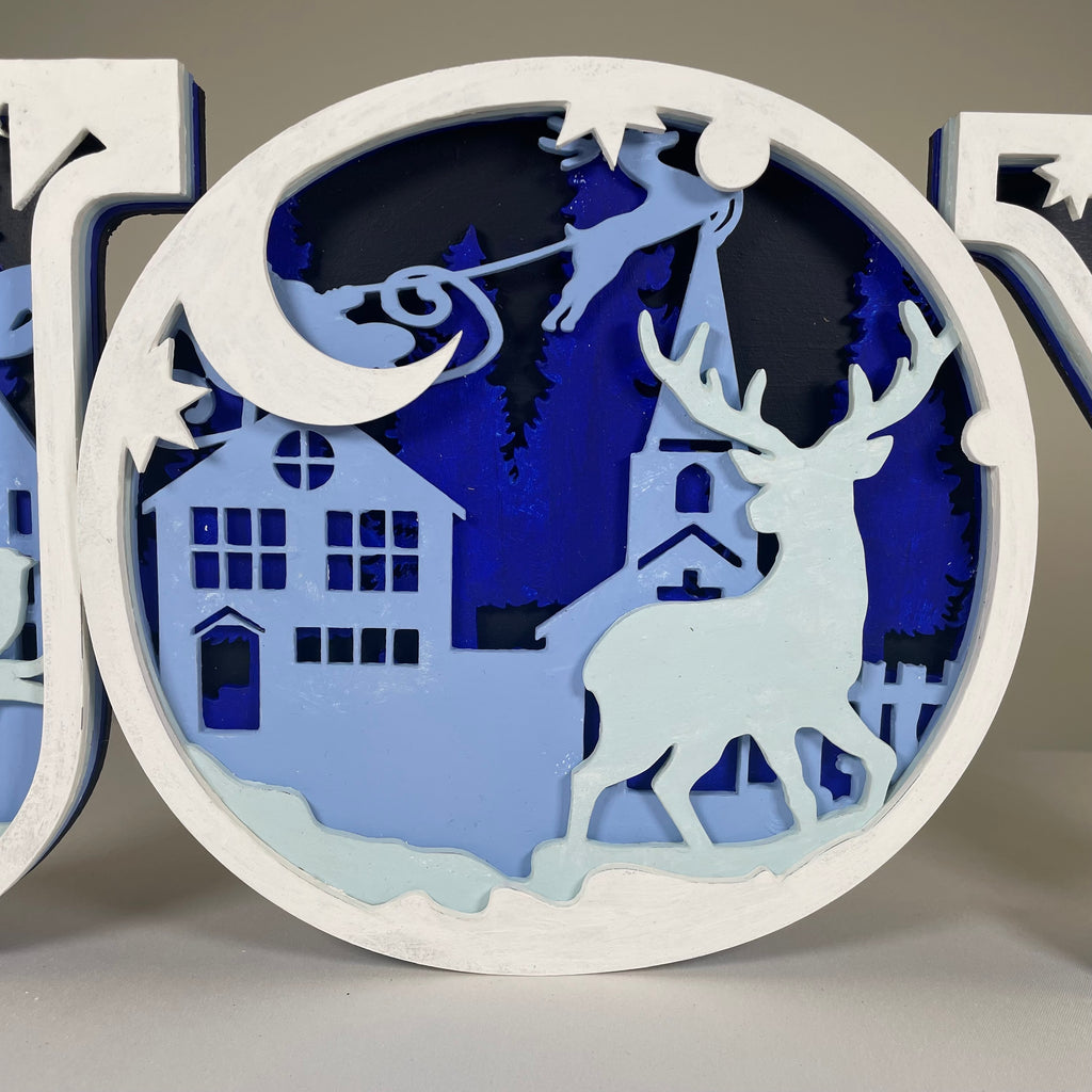 Handmade Christmas joy sign ornament by Curious Rabbit featuring festive holiday design for seasonal decor.