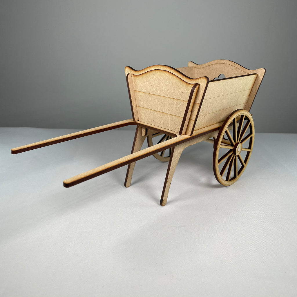Curious Rabbit flatpack garden cart planter kit with assembled wooden cart and plant containers, ready for gardening display