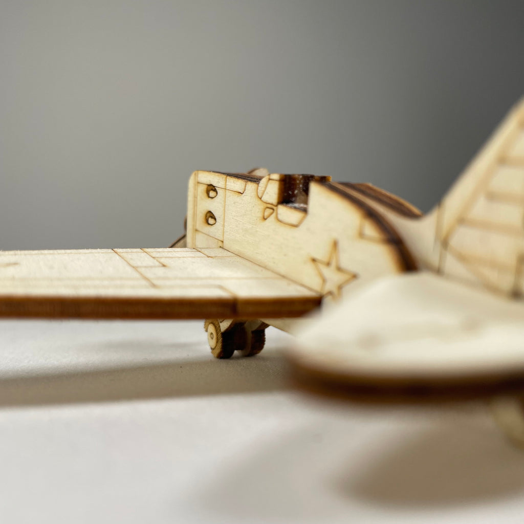 Handmade Curious Rabbit plane ornament with historical design, featuring detailed craftsmanship and vintage-inspired style.
