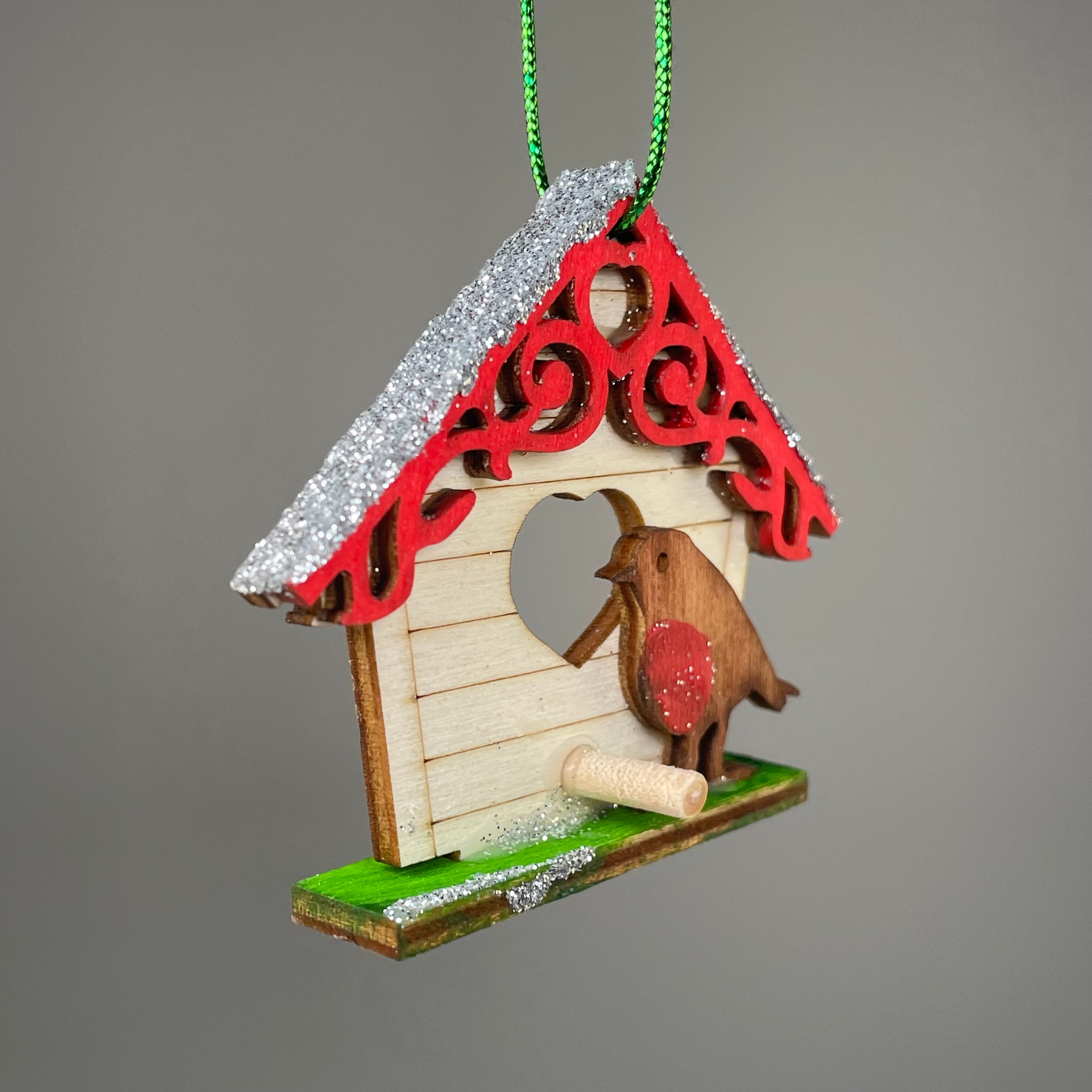 Handmade Curious Rabbit Christmas birdhouse bauble ornament with festive holiday design, perfect for decorating Christmas trees.