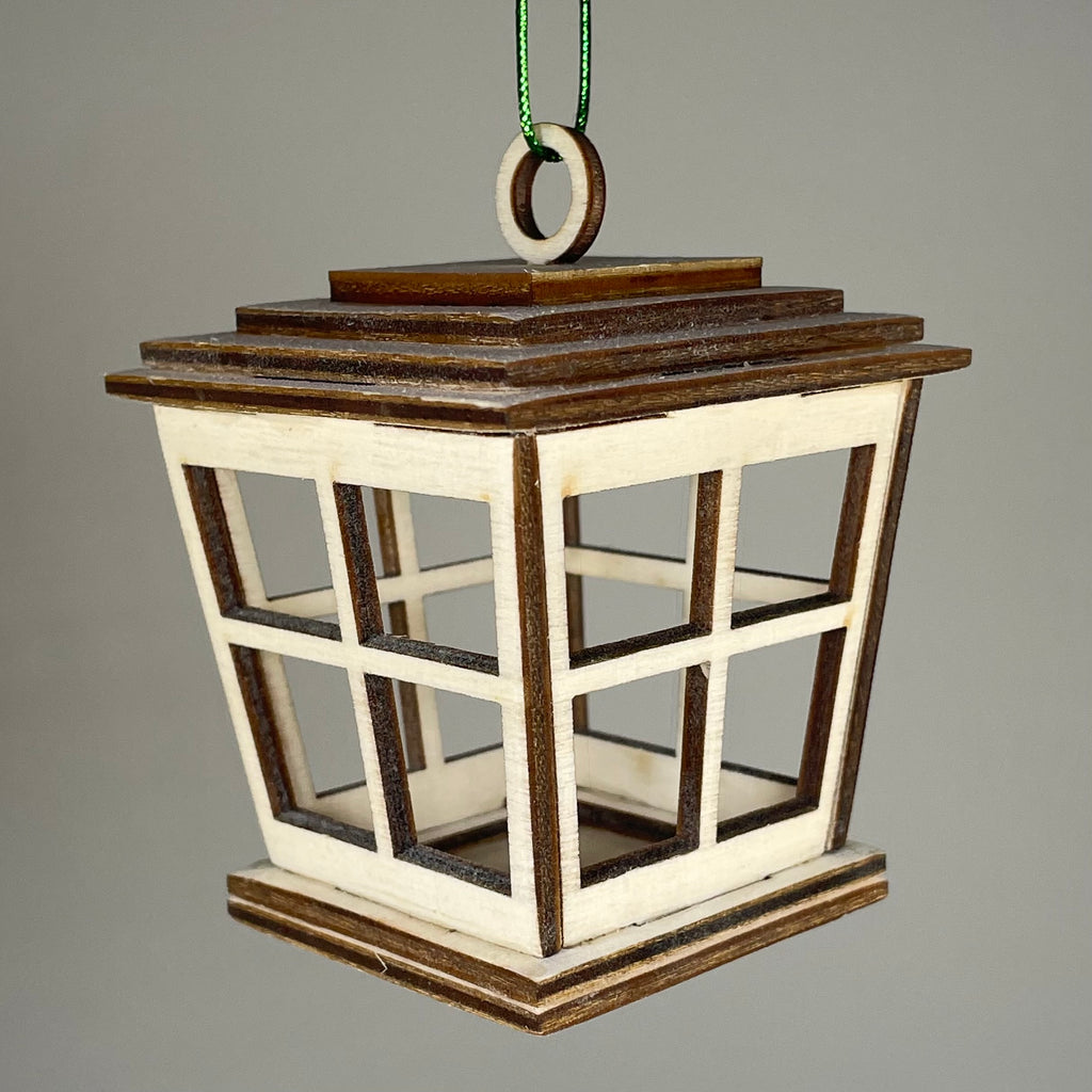 Handmade Victorian Christmas Lantern Bauble by Curious Rabbit, featuring intricate details and festive holiday decoration.