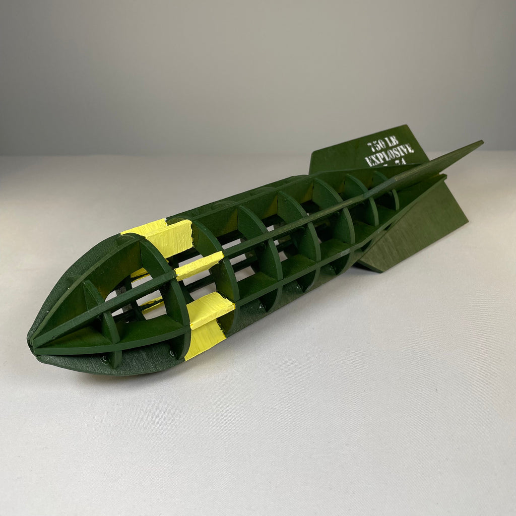 Flatpack model kit of a WW2 bomb by Curious Rabbit, detailed historical replica for assembly and display.