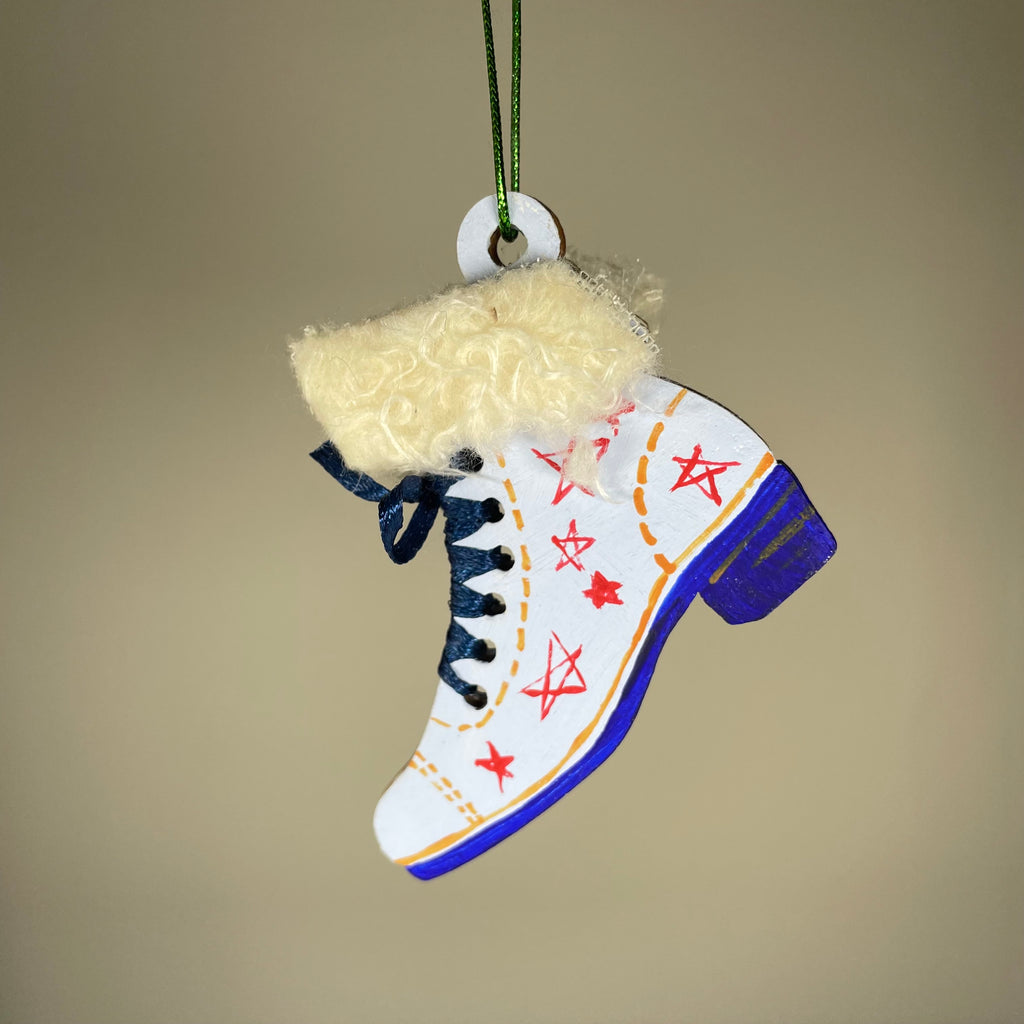 Handmade Christmas ice skate ornament by Curious Rabbit, featuring a festive bauble design for holiday decoration.