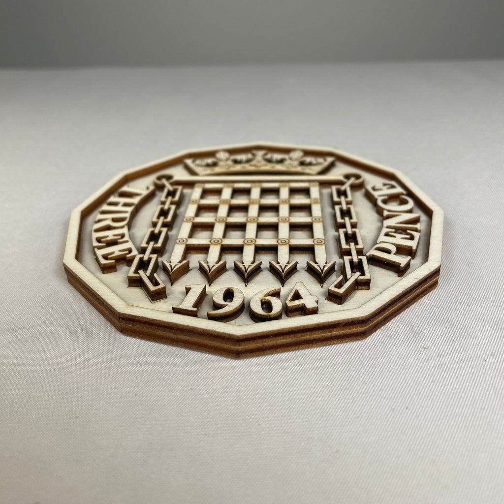 Handmade Three Pence coaster by Curious Rabbit featuring intricate icon designs on ceramic tableware.