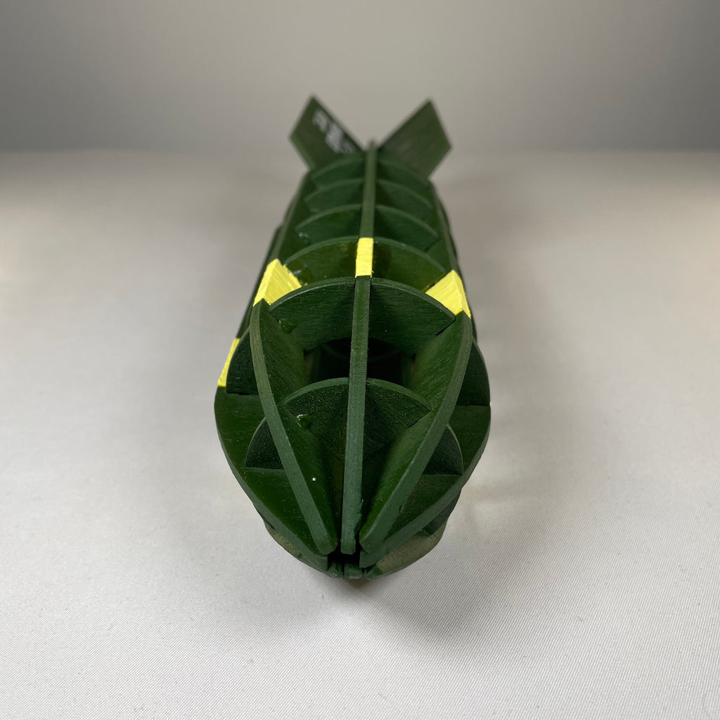 Flatpack model kit of a WW2 bomb by Curious Rabbit, detailed history-themed plastic bomb replica for assembly and display.