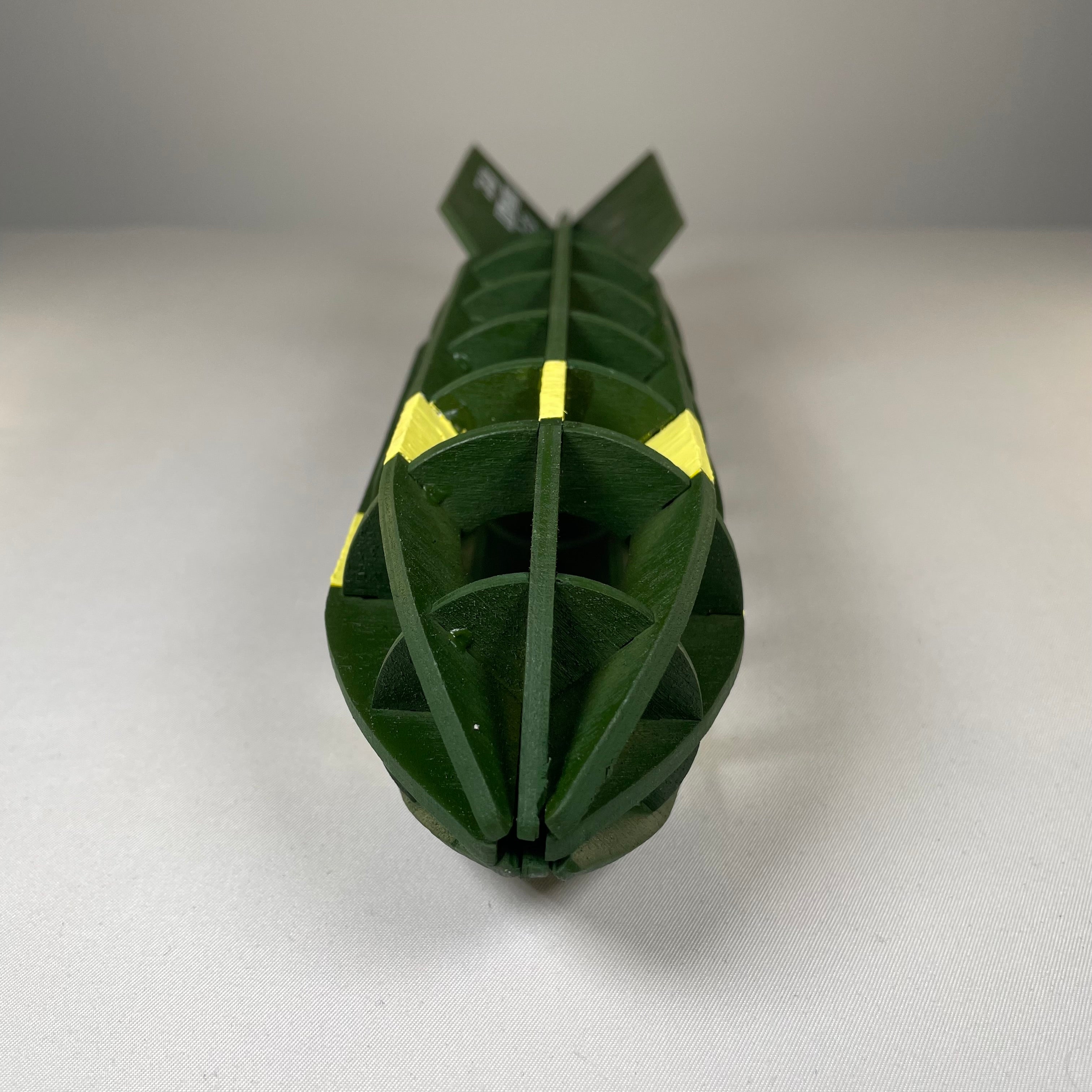 Flatpack model kit of a WW2 bomb by Curious Rabbit, detailed history-themed plastic bomb replica for assembly and display.