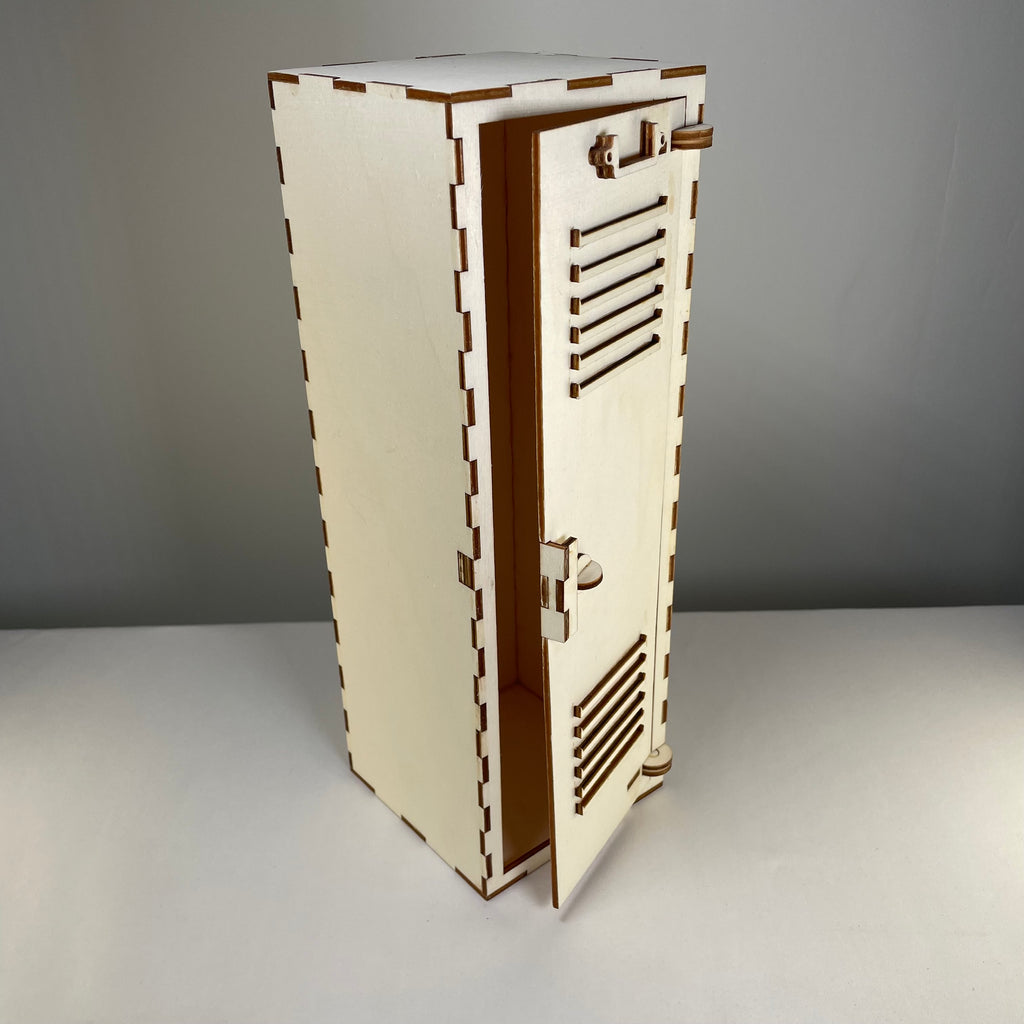 Vintage Curious Rabbit school locker flatpack model kit with detailed miniature metal and plastic parts for assembly.