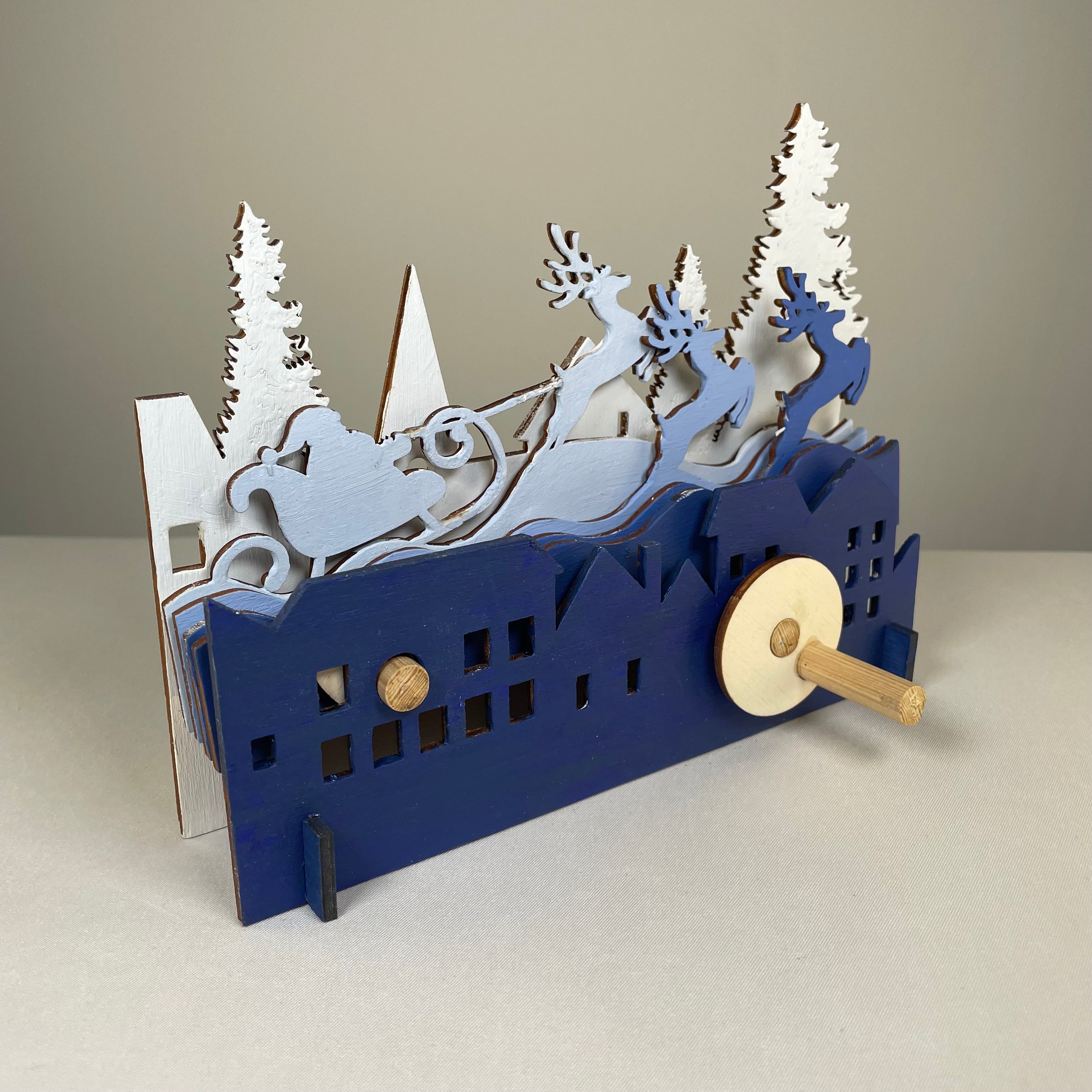 Mechanical Santa sleigh flatpack model kit by Curious Rabbit, featuring a festive Christmas design with detailed mechanical parts.