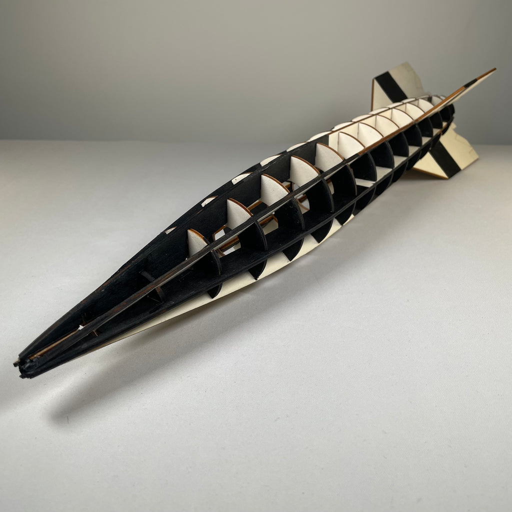 Curious Rabbit Prop V2 Rocket flatpack model kit, detailed history-themed model with parts assembled for display.