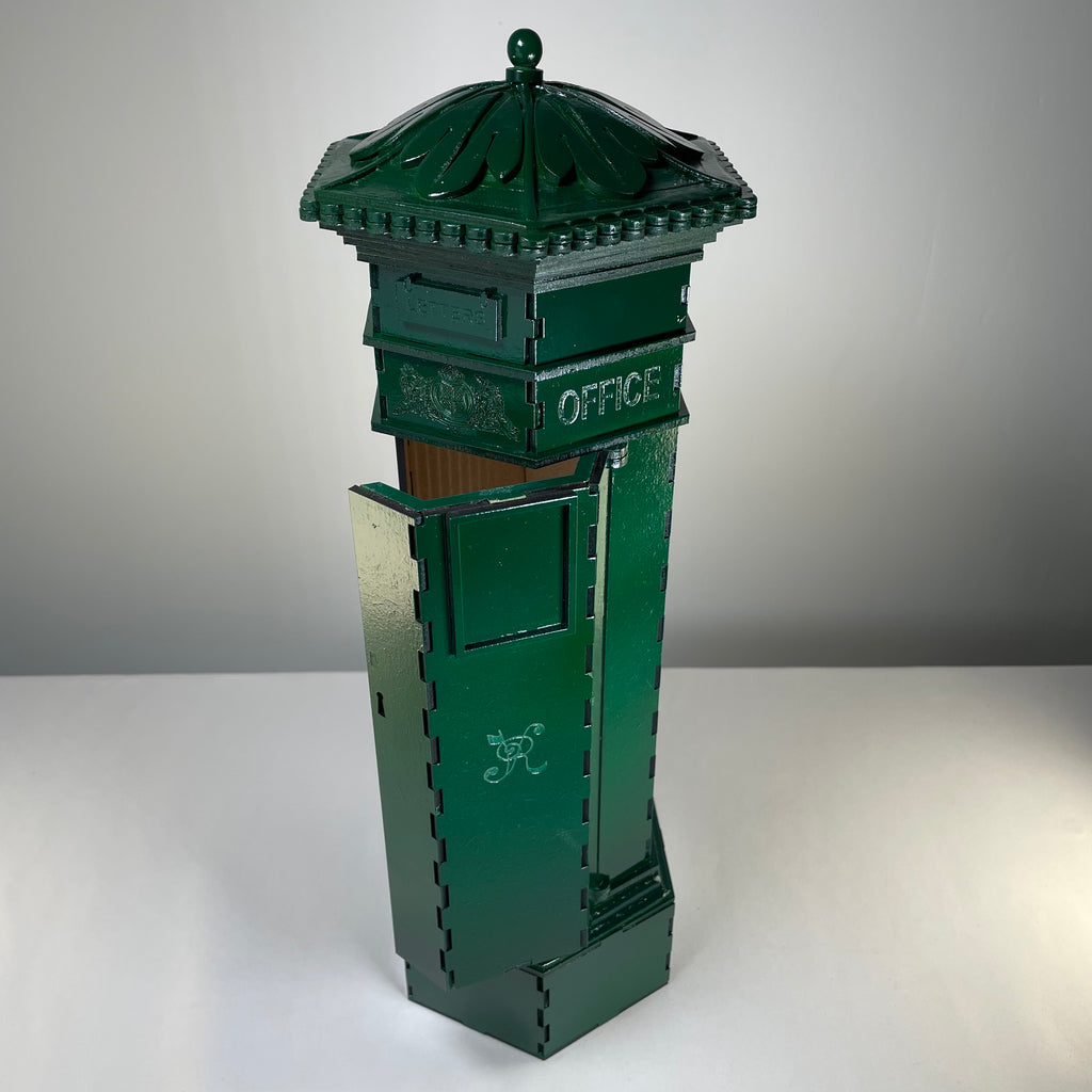 Curious Rabbit Penfold Pillar Post Box flatpack model kit, icon-style illustration with detailed post box design.