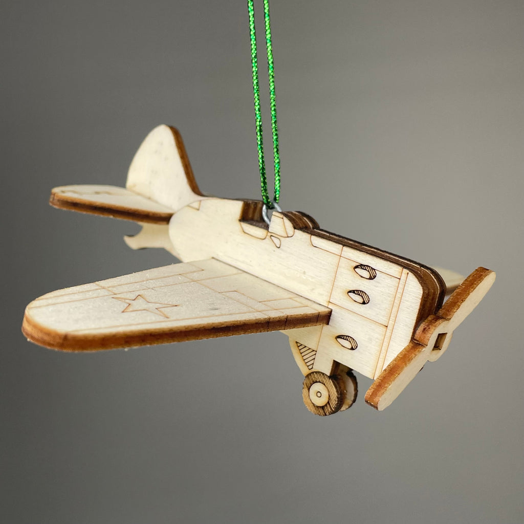 Handmade Curious Rabbit Plane Bauble ornament with vintage airplane design, crafted as a decorative historical-themed ornament.