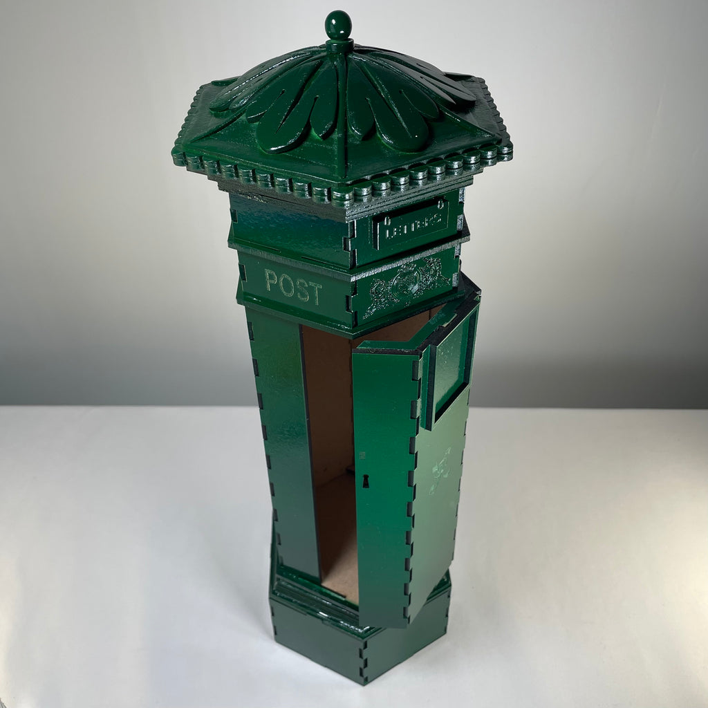 Curious Rabbit Penfold Pillar Post Box flatpack model kit with icon-style design, featuring detailed post box components.