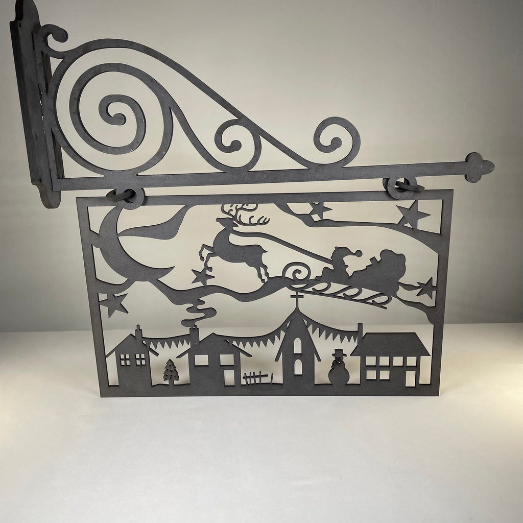 Handmade Hanging Santa Scene Christmas ornament by Curious Rabbit, featuring festive Santa design on a rustic wooden sign.