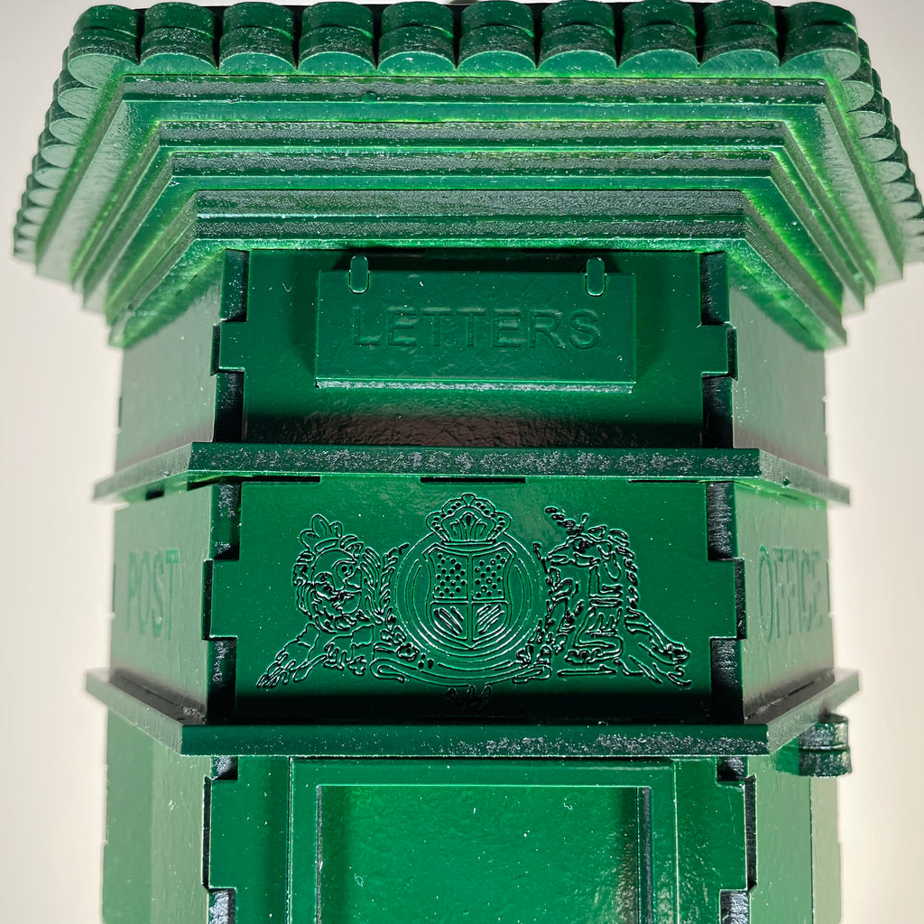 Curious Rabbit Penfold Pillar Post Box flatpack model kit icon, showing detailed assembled post box with postal slot and decorative features.