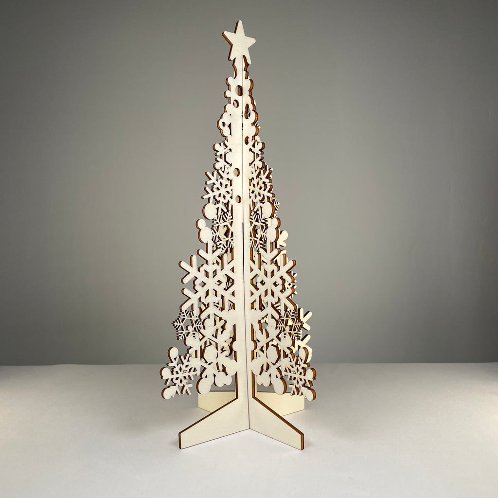 Curious Rabbit flatpack Christmas Tree #3 model kit with assembled tree and packaging, perfect for holiday decorating and DIY projects.