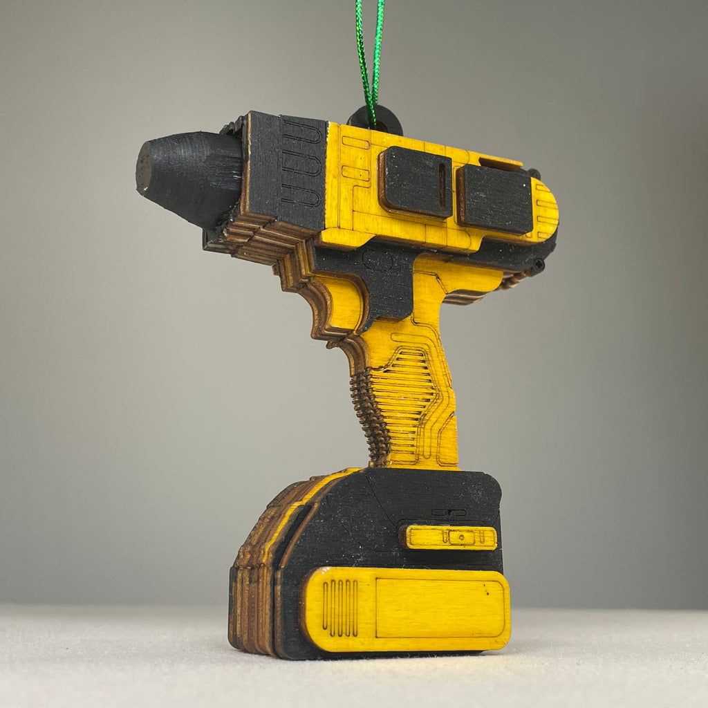Handmade Power Drill Bauble ornament from Curious Rabbit, designed as a detailed miniature toolbox decoration.
