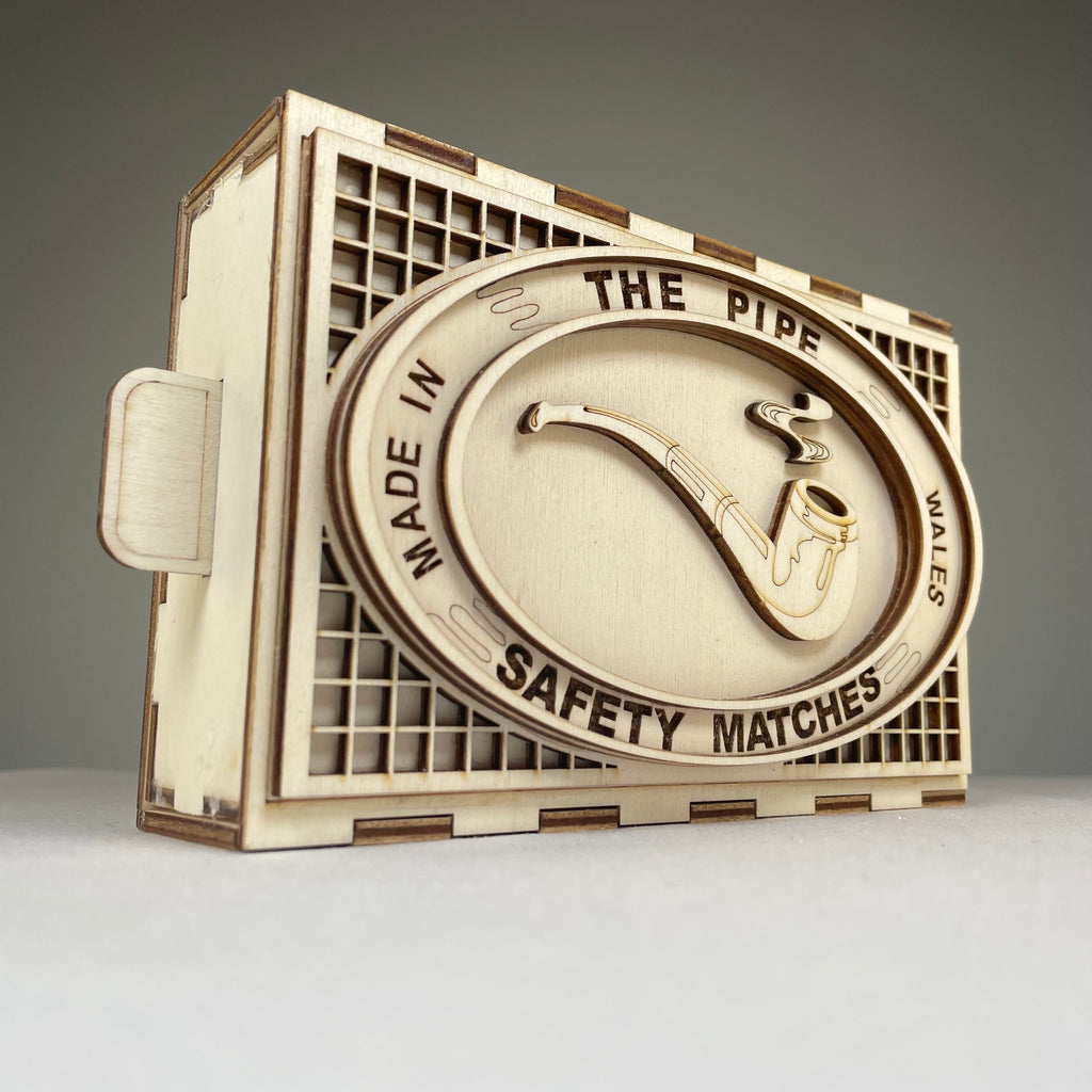 Vintage Curious Rabbit Matchbox pipe flatpack model kit with detailed parts and assembly components.