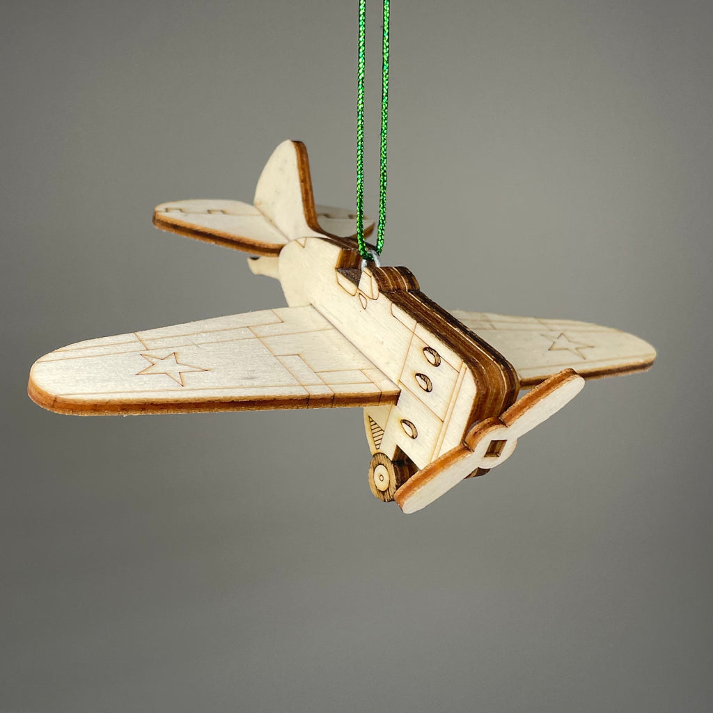 Handmade Curious Rabbit Plane Bauble ornament with vintage airplane design, crafted as a historical-themed decorative hanging ornament.