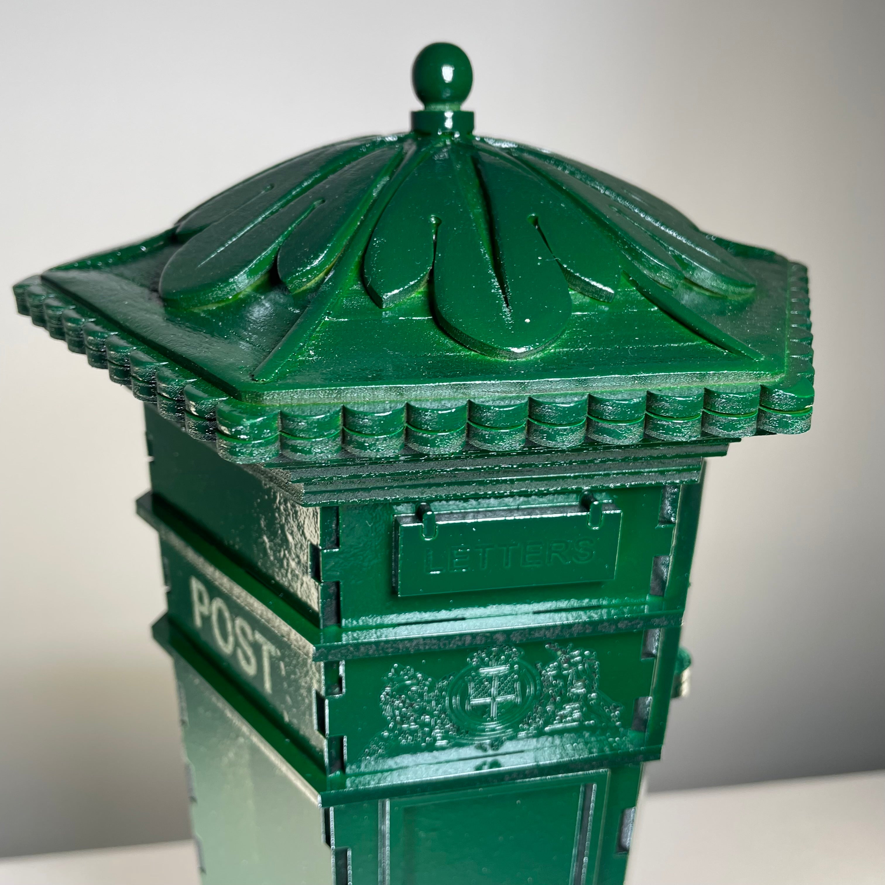 Curious Rabbit Penfold Pillar Post Box flatpack model kit with icon design, assembled showing postal box details.
