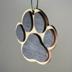 Handmade Curious Rabbit pet ornament featuring a dog paw print design, perfect as a decorative dog-themed bauble.