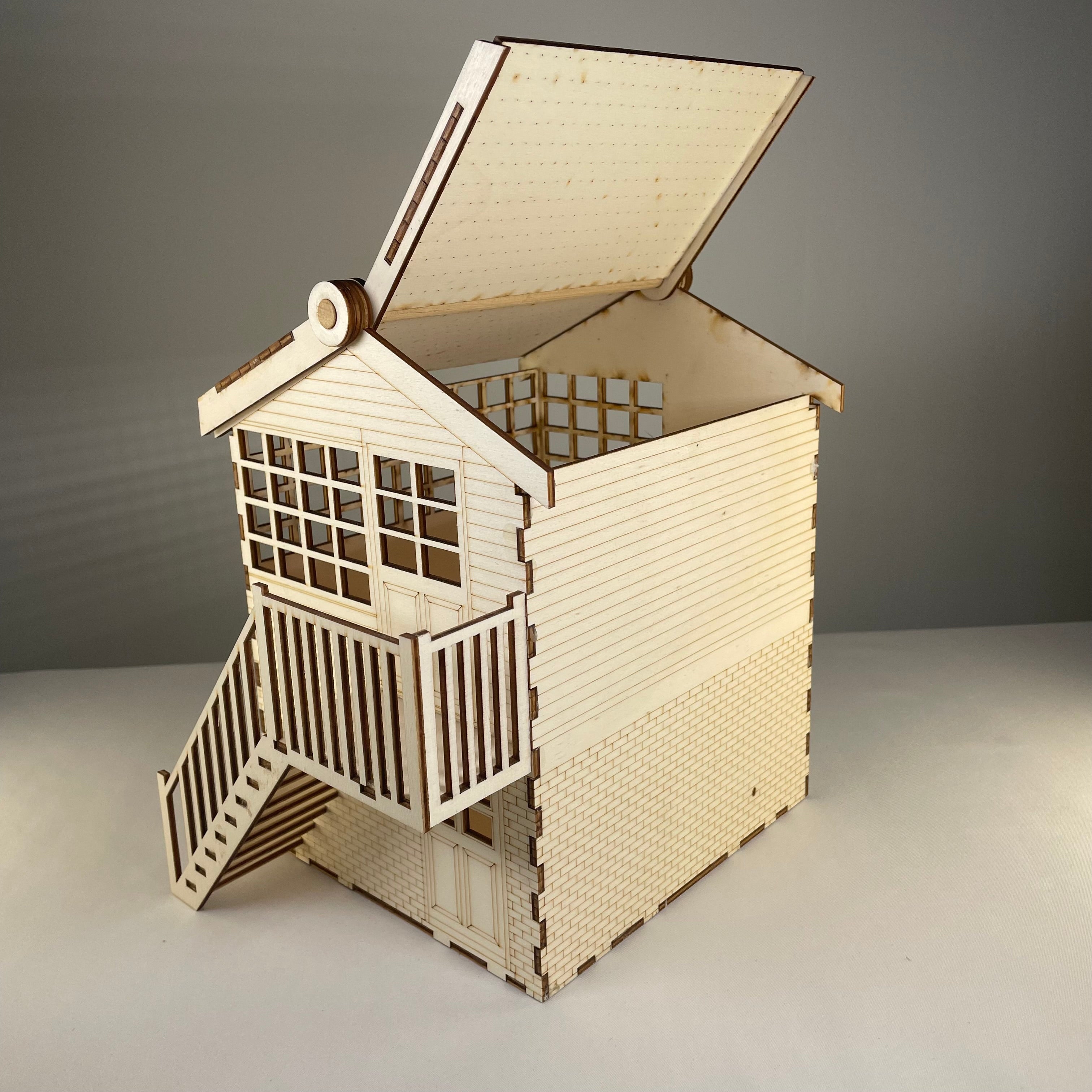 Curious Rabbit railway signal box flatpack model kit, detailed miniature railway signal box for model train setups.
