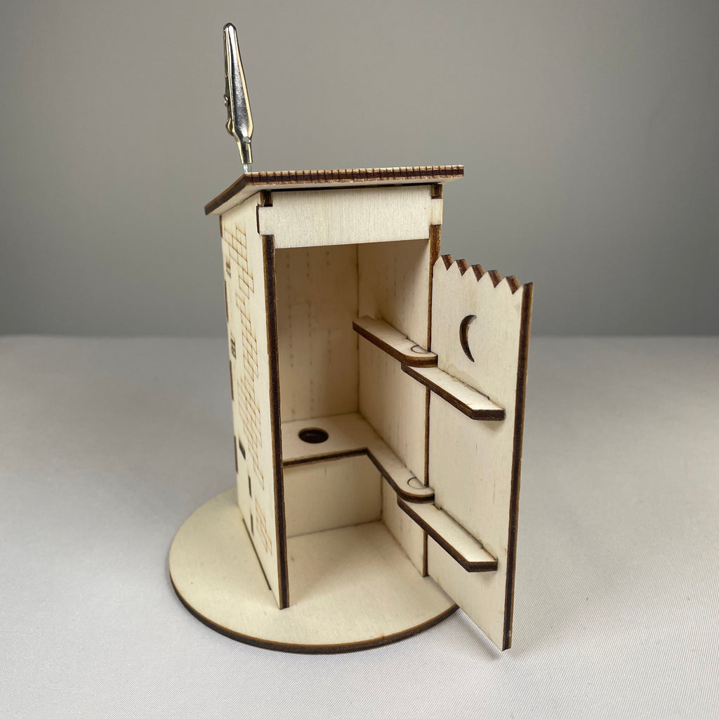 Architecture Outhouse Toilet Flatpack Memo Holder by Curious Rabbit, featuring a detailed miniature outhouse design with flatpack assembly.