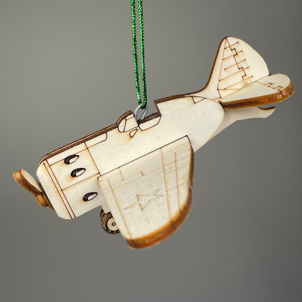 Handmade Curious Rabbit Plane Bauble ornament with vintage airplane design, perfect for historical-themed holiday decor.
