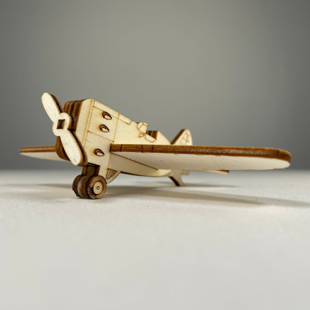 Handmade plane decoration ornament by Curious Rabbit, featuring historical design, perfect for vintage or aviation-themed decor.