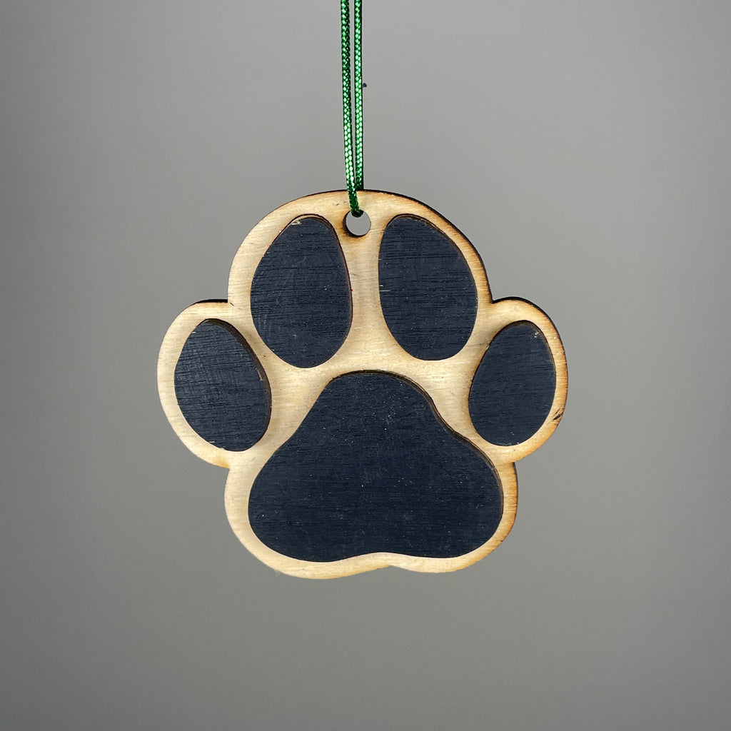 Handmade Curious Rabbit dog paw print ornament with pet-themed design, suitable for holiday or decorative display.
