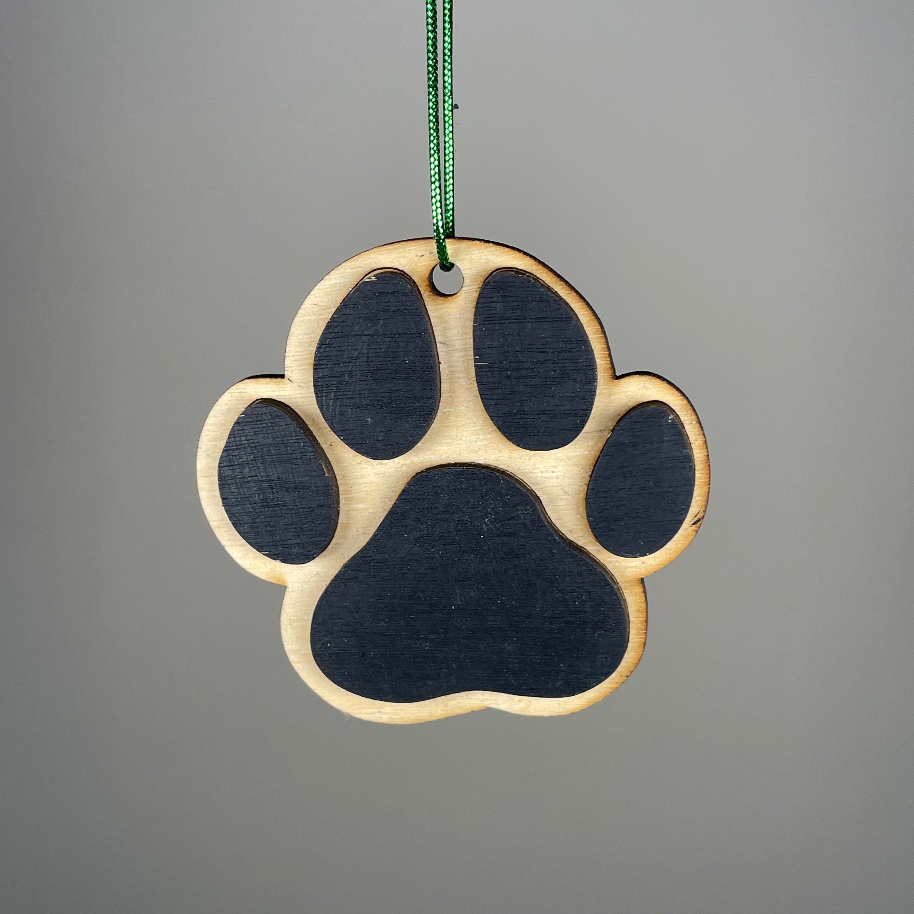 Handmade Curious Rabbit dog paw print ornament with pet-themed design, suitable for holiday or decorative display.