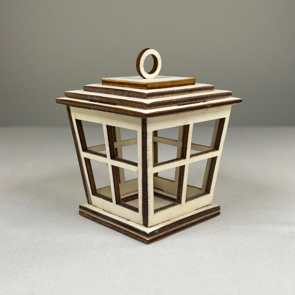 Handmade Victorian Christmas lantern bauble by Curious Rabbit, featuring intricate festive design for holiday decorations.