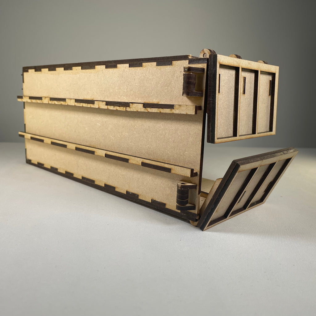Icons depicting Curious Rabbit's roll-on/roll-off skip flatpack model kit, featuring a compact skip container in black and white.