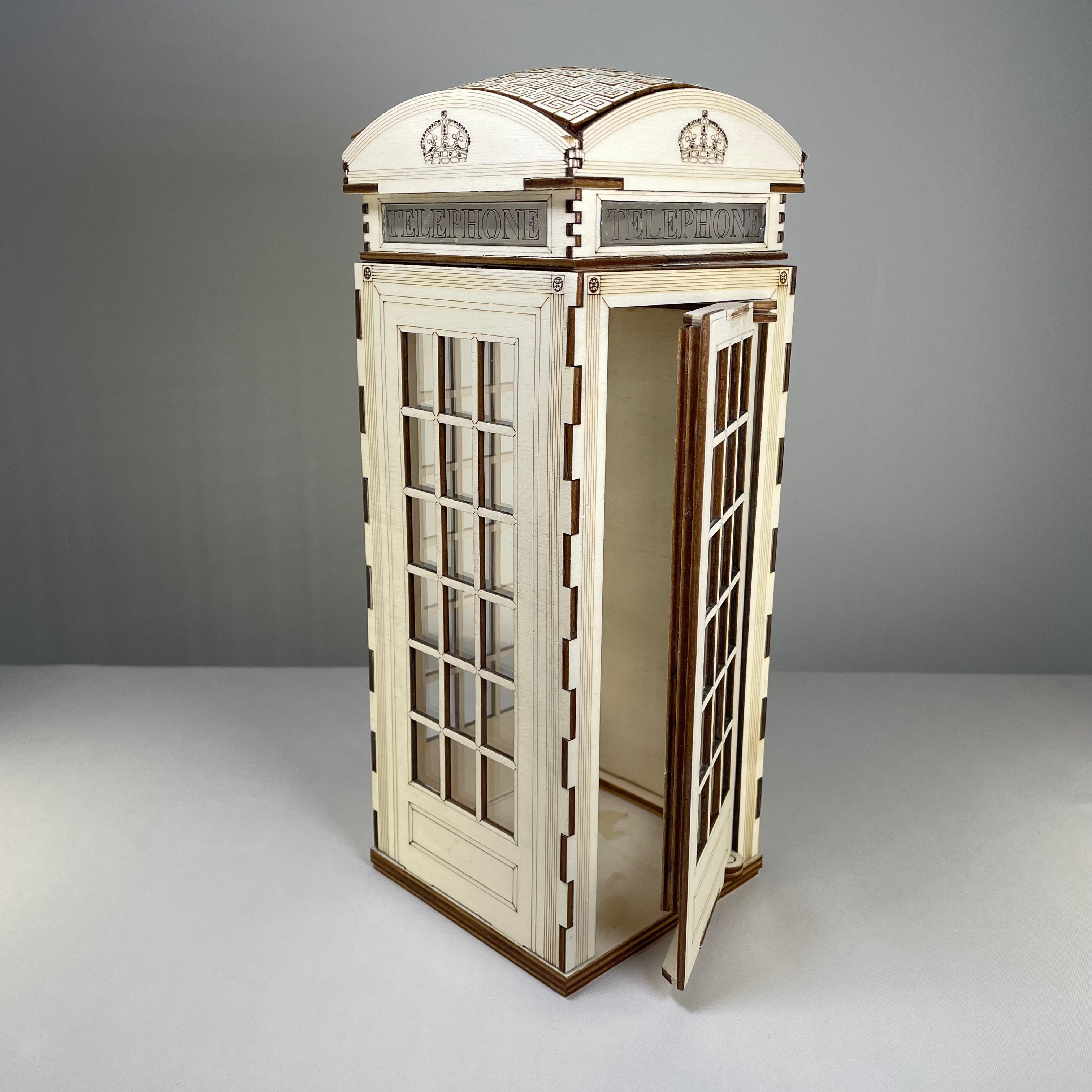 Curious Rabbit Telephone Box Lamp icon flatpack model kit, flatpack design with detailed telephone box shape in bright colors.