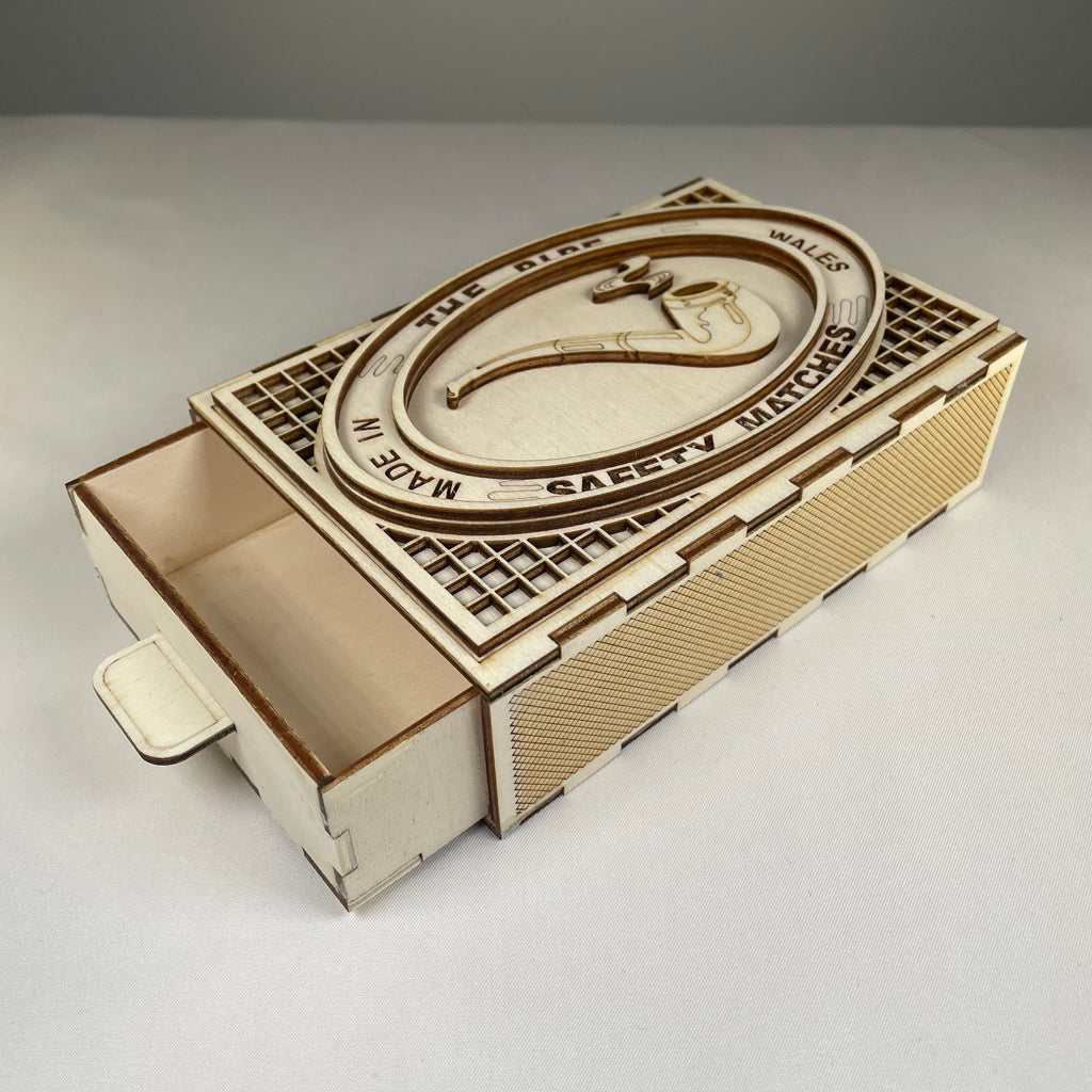 Vintage Curious Rabbit matchbox pipe flatpack model kit with detailed paper components and assembly instructions.