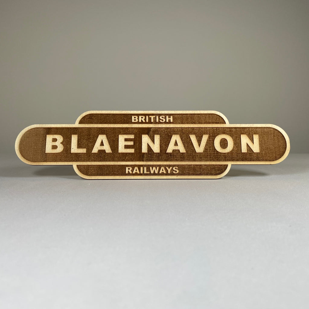 Handmade Curious Rabbit railway train station sign ornament with vintage-style lettering and detailed craftsmanship.